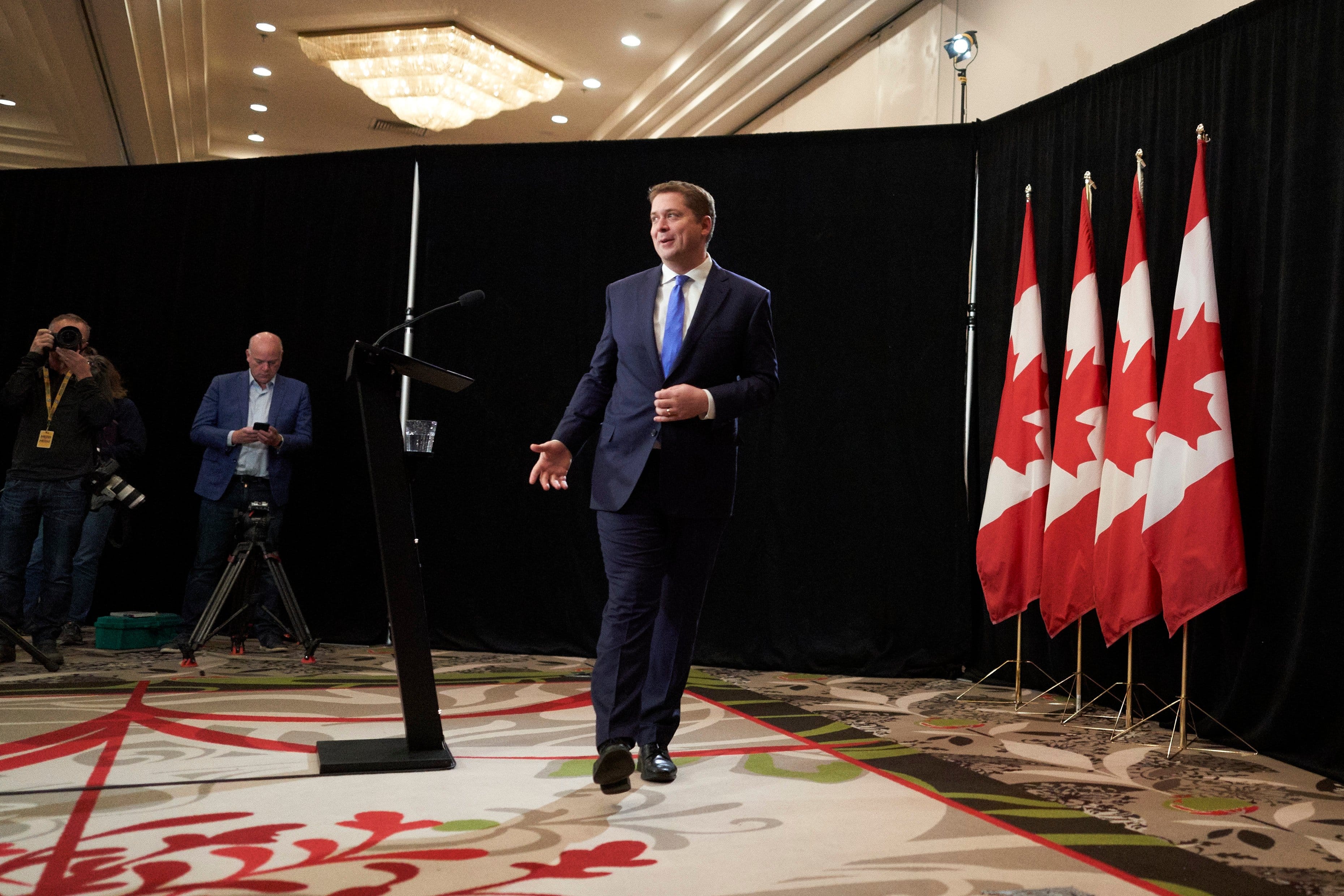 Scheer walks away following a press conference in Regina on Oct. 22, 2019 (GEOFF ROBINS/AFP via Getty Images)
