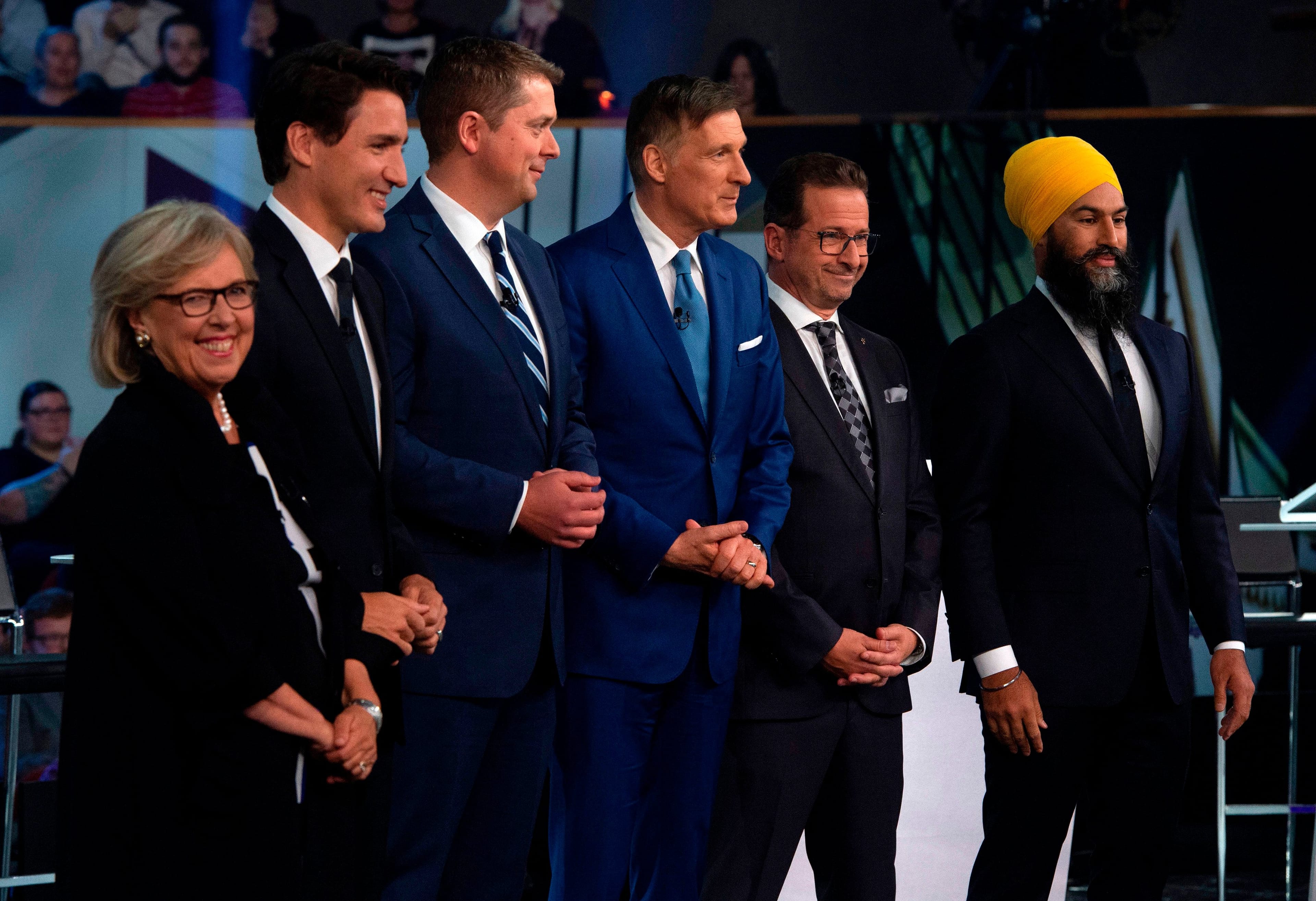 May, Trudeau, Scheer, Bernier, Blanchet and Singh post for a photo before the Federal Leaders Debate, on Oct. 7, 2019 (Sean Kilpatrick/POOL/AFP/Getty Images)