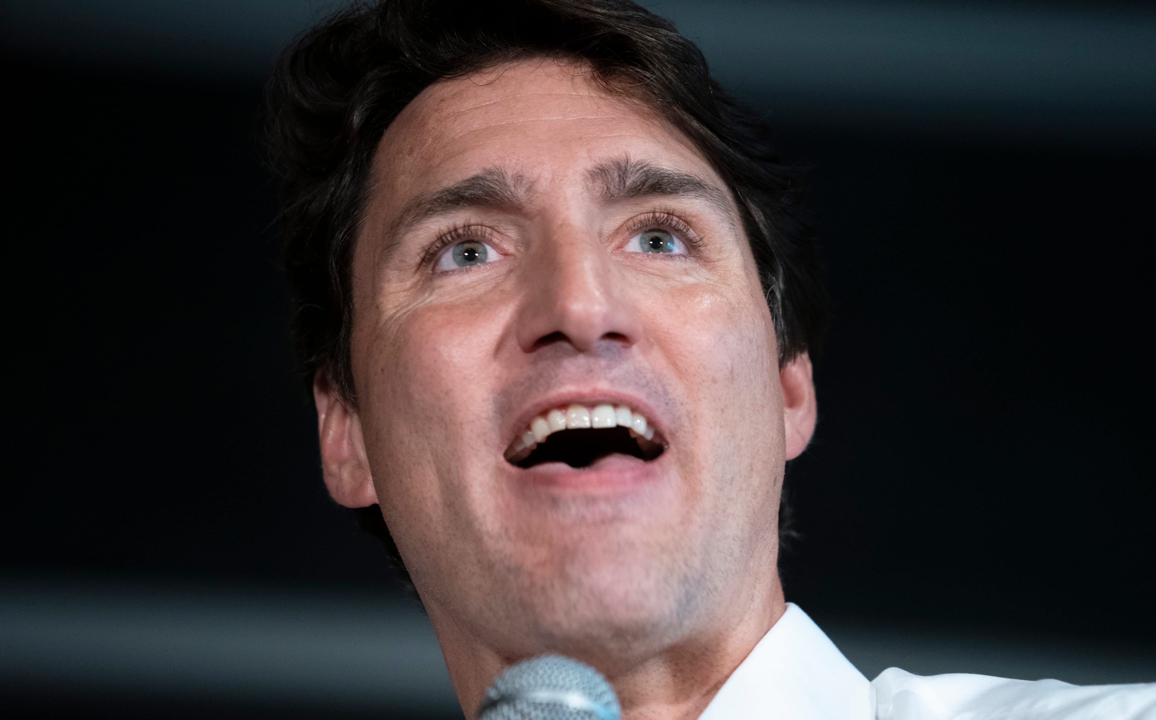 A defiant Trudeau delivering remarks in August at a nomination meeting for a Liberal candidate in Montreal, shortly after the release of a scathing ethics report on Trudeau's handling of the SNC-Lavalin affair (Paul Chiasson/CP)