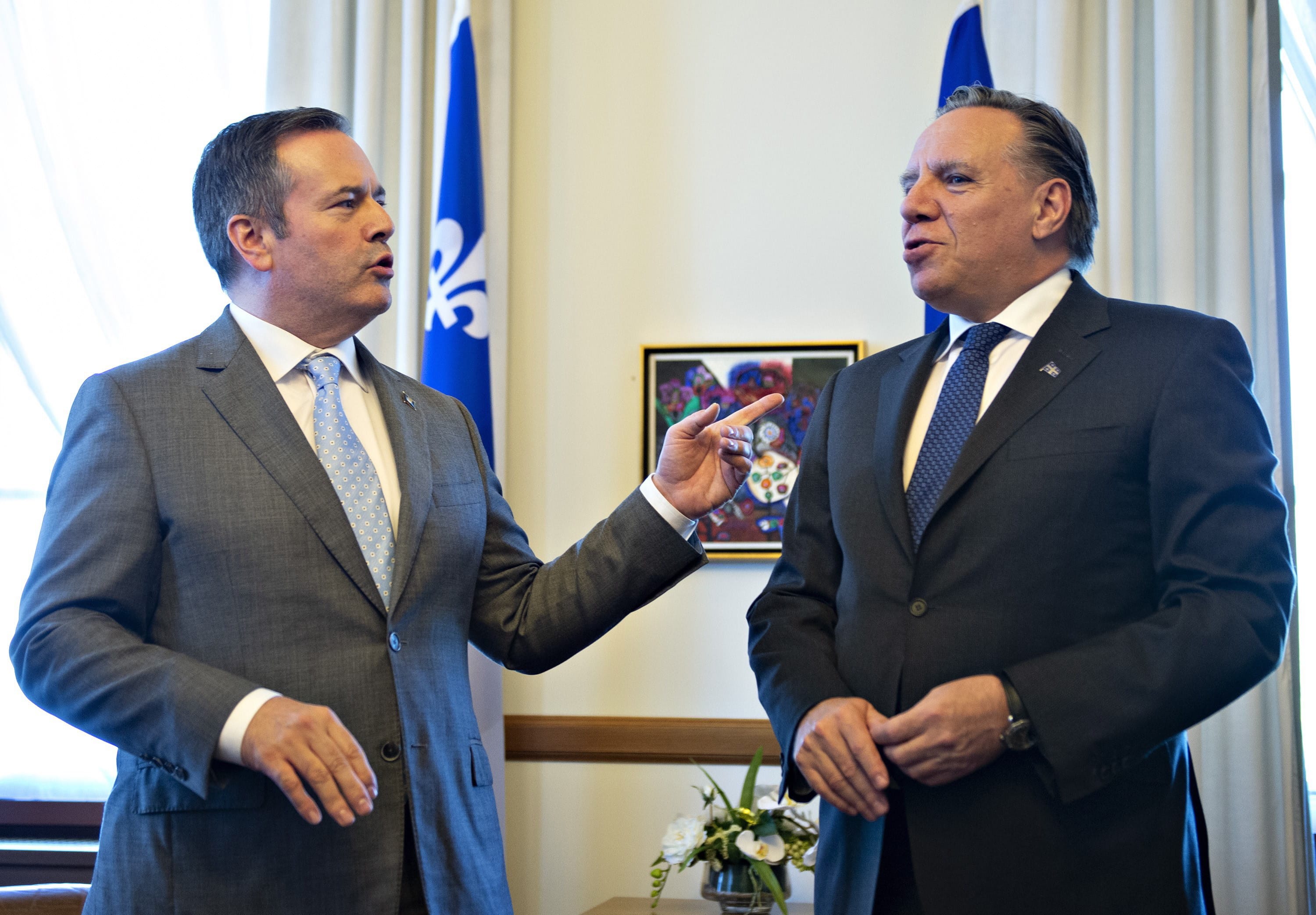 Kenney chats with Quebec Premier Francois Legault on June 12, 2019, at the Quebec Premier's office in Quebec City. (Jacques Boissinot/CP)