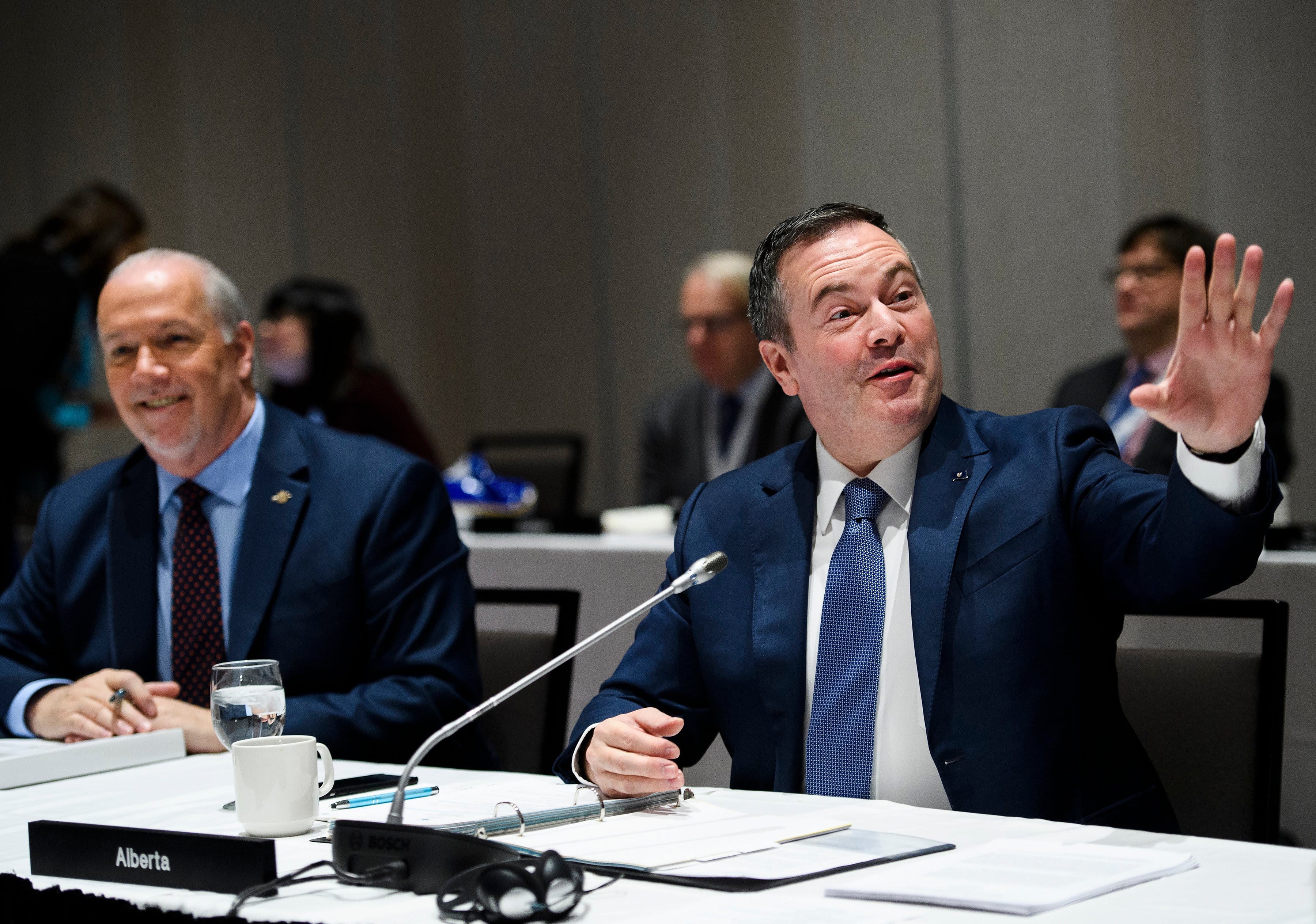 Kenney (right) and B.C. Premier John Horgan attend the Council of the Federation gathering on Dec. 2, 2019 (THE CANADIAN PRESS/Nathan Denette)