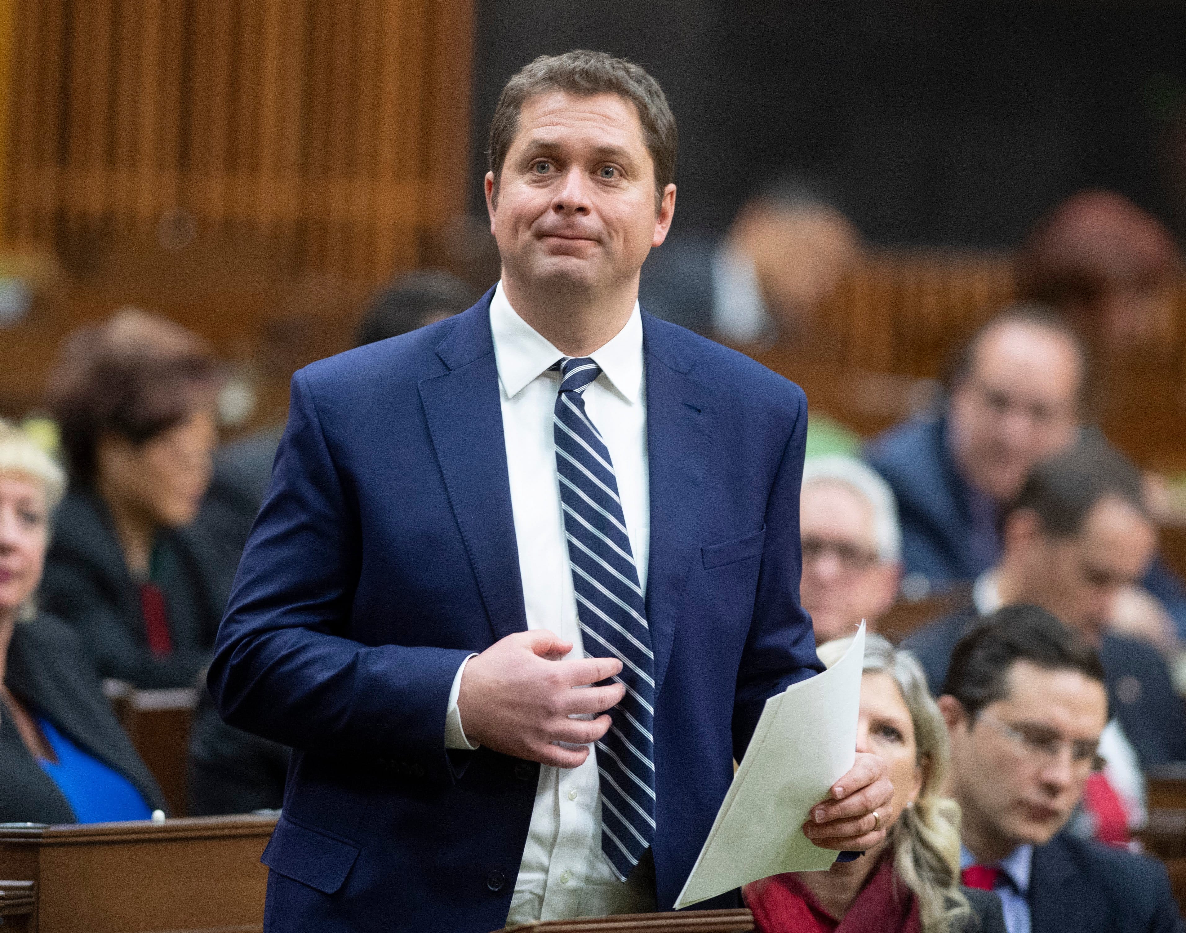 Leader of the Opposition Andrew Scheer rises to announce he will step down as leader of the Conservatives, Thursday December 12, 2019 in the House of Commons in Ottawa. (Adrian Wyld/CP)