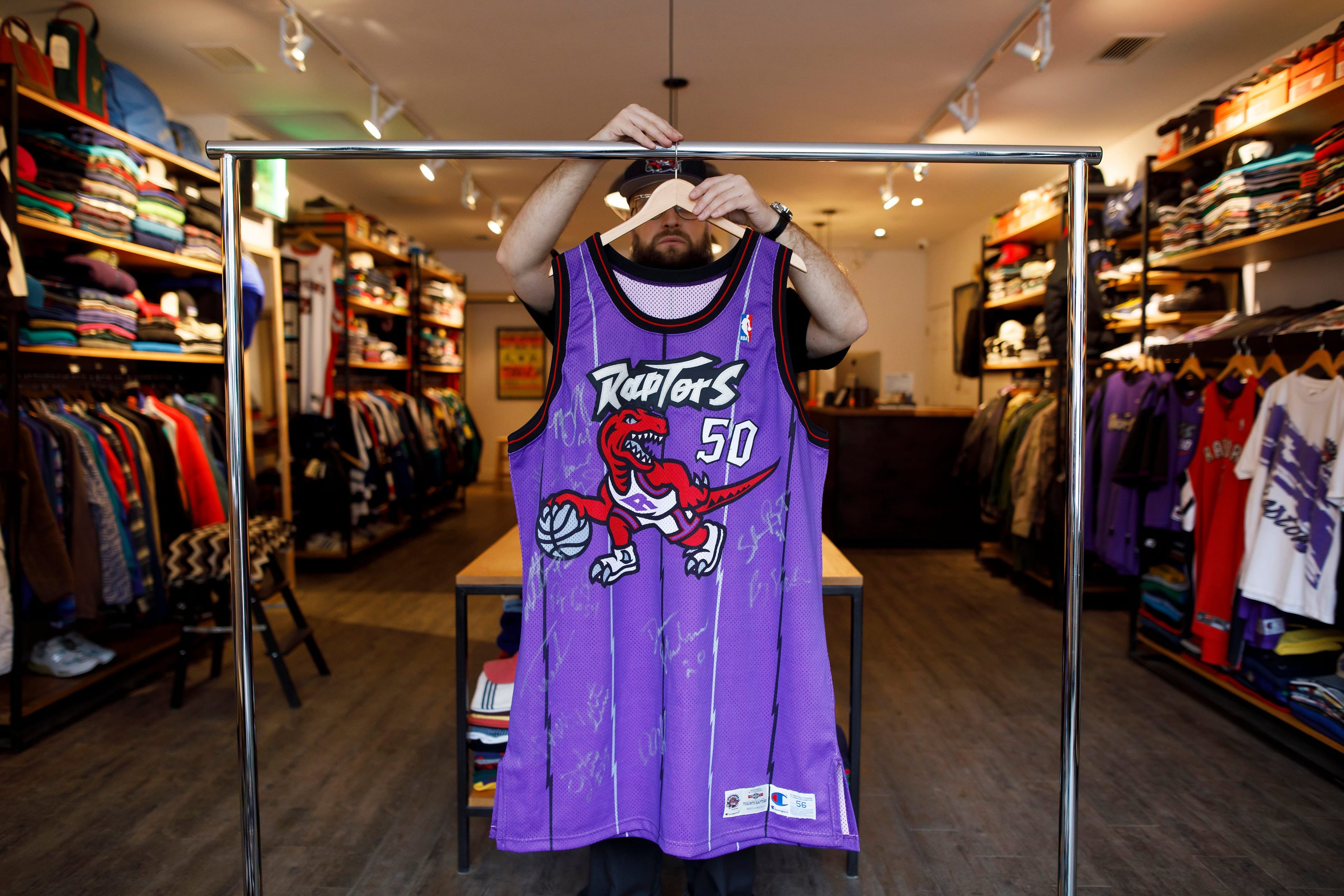 An inaugural season game-worn Raptors jersey, signed by the entire team. (Photograph by Cole Burston)