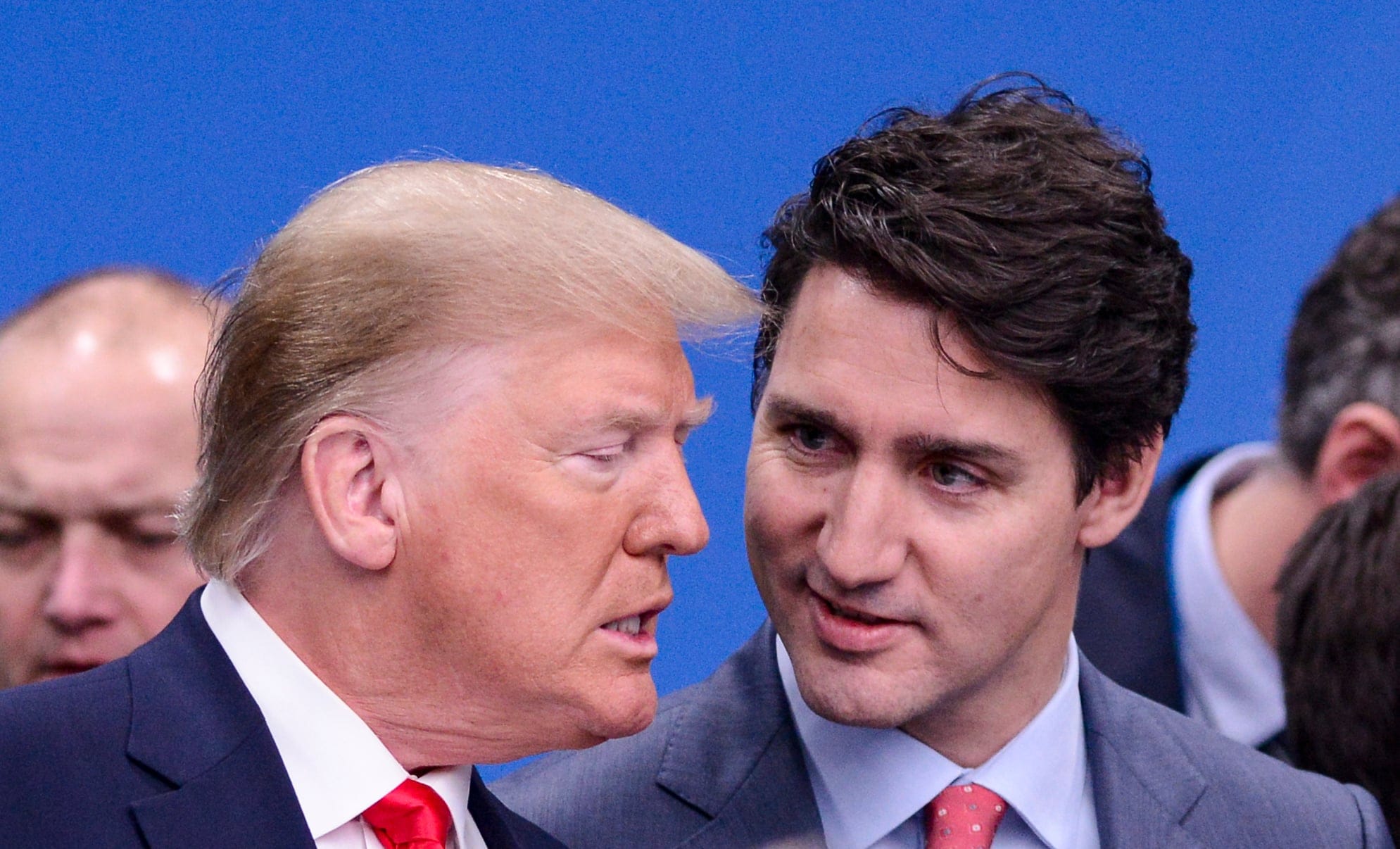 Prime Minister Justin Trudeau and U.S. President Donald Trump arrive to take part in a plenary session at the NATO Summit in Watford, Hertfordshire, England, on Wednesday, Dec. 4, 2019. (Sean Kilpatrick/CP)