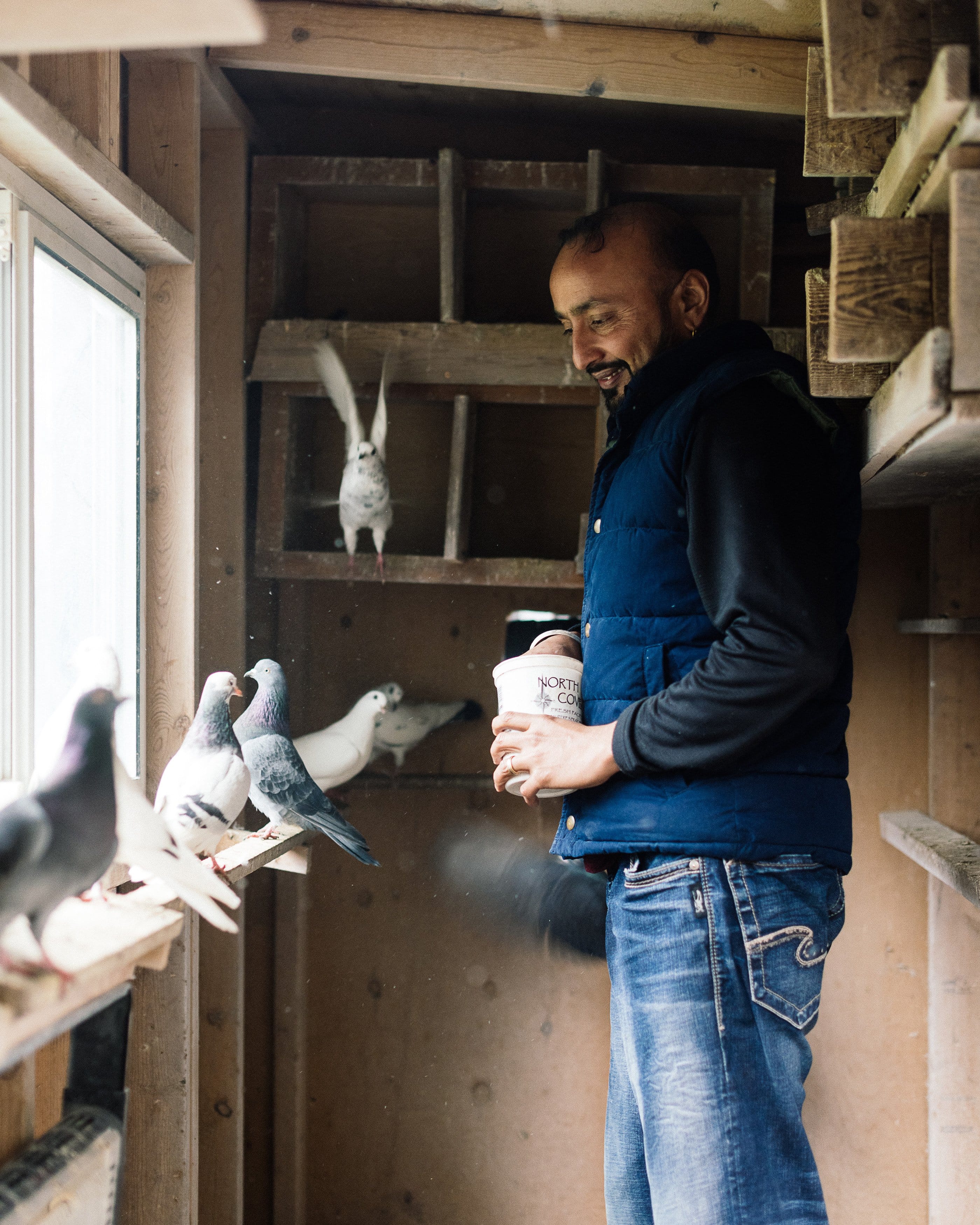 Dulay with his pigeons (Photograph by Alana Paterson)