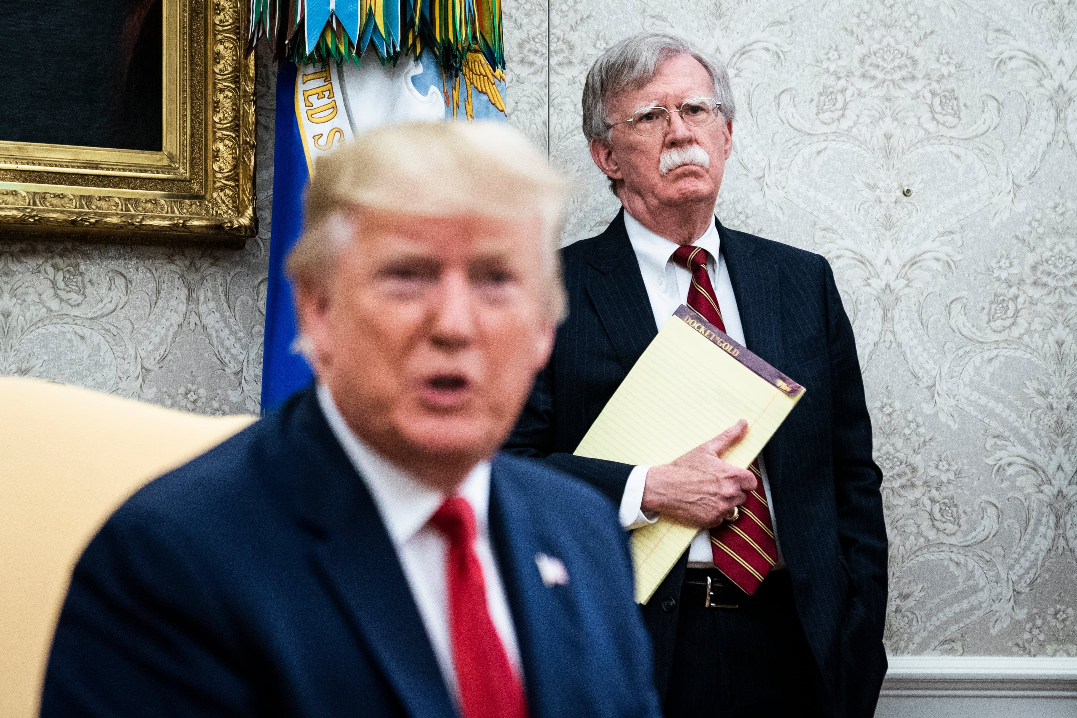 Bolton watches on as Trump meets with Prime Minister of the Netherlands Mark Rutte in the Oval Office on July 18, 2019 (Jabin Botsford/The Washington Post via Getty Images)