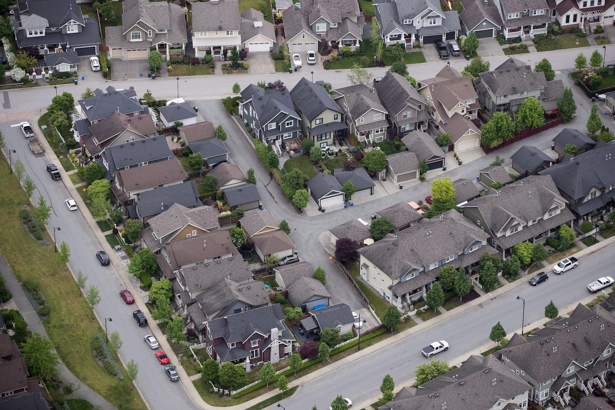 Houses and townhouses are seen in an aerial view, in Langley, B.C., on Wednesday May 16, 2018. (Darryl Dyck/CP)