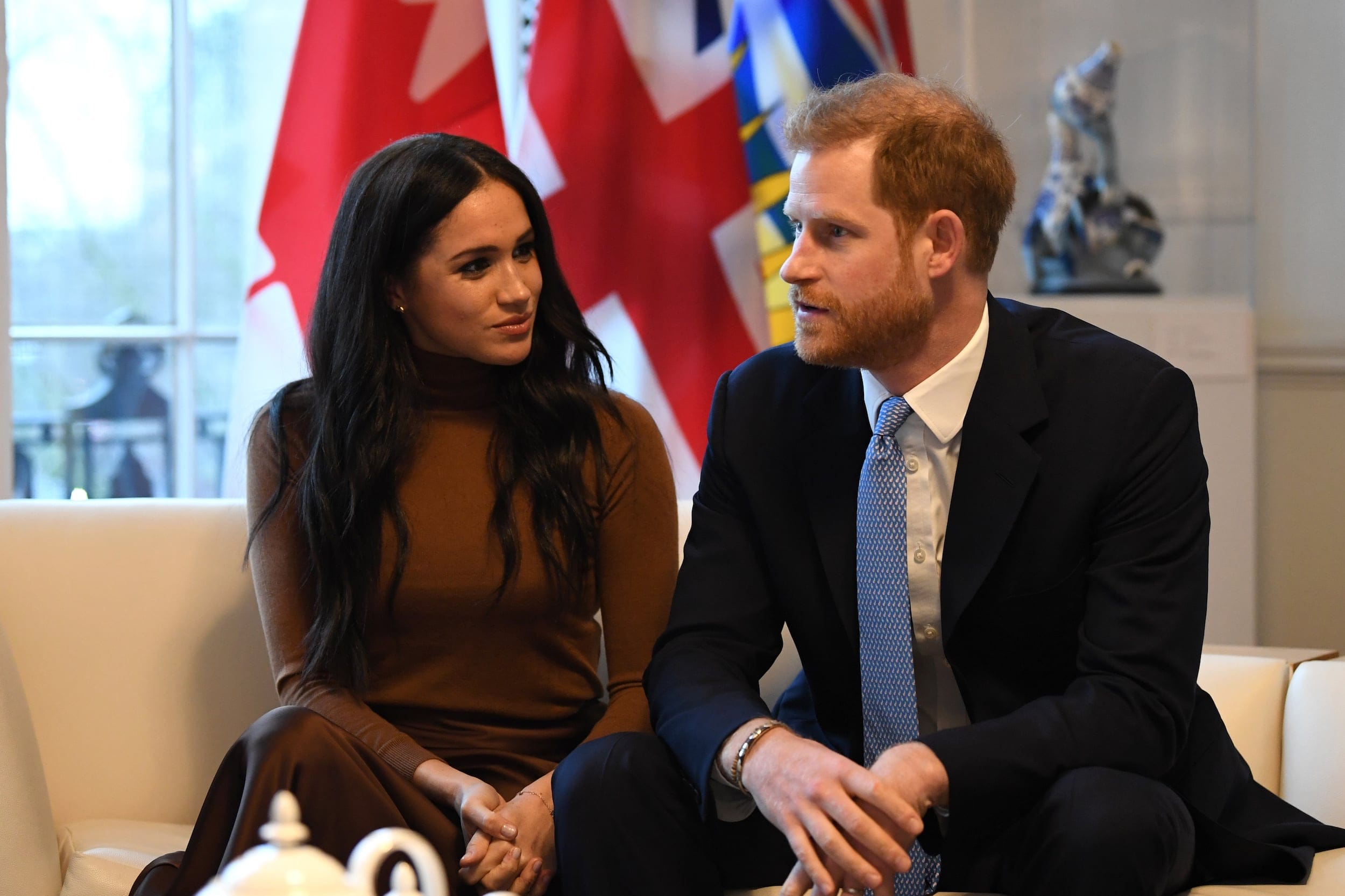 LONDON, UNITED KINGDOM - JANUARY 07: Prince Harry, Duke of Sussex and Meghan, Duchess of Sussex gesture during their visit to Canada House in thanks for the warm Canadian hospitality and support they received during their recent stay in Canada, on January 7, 2020 in London, England. (Photo by DANIEL LEAL-OLIVAS - WPA Pool/Getty Images)