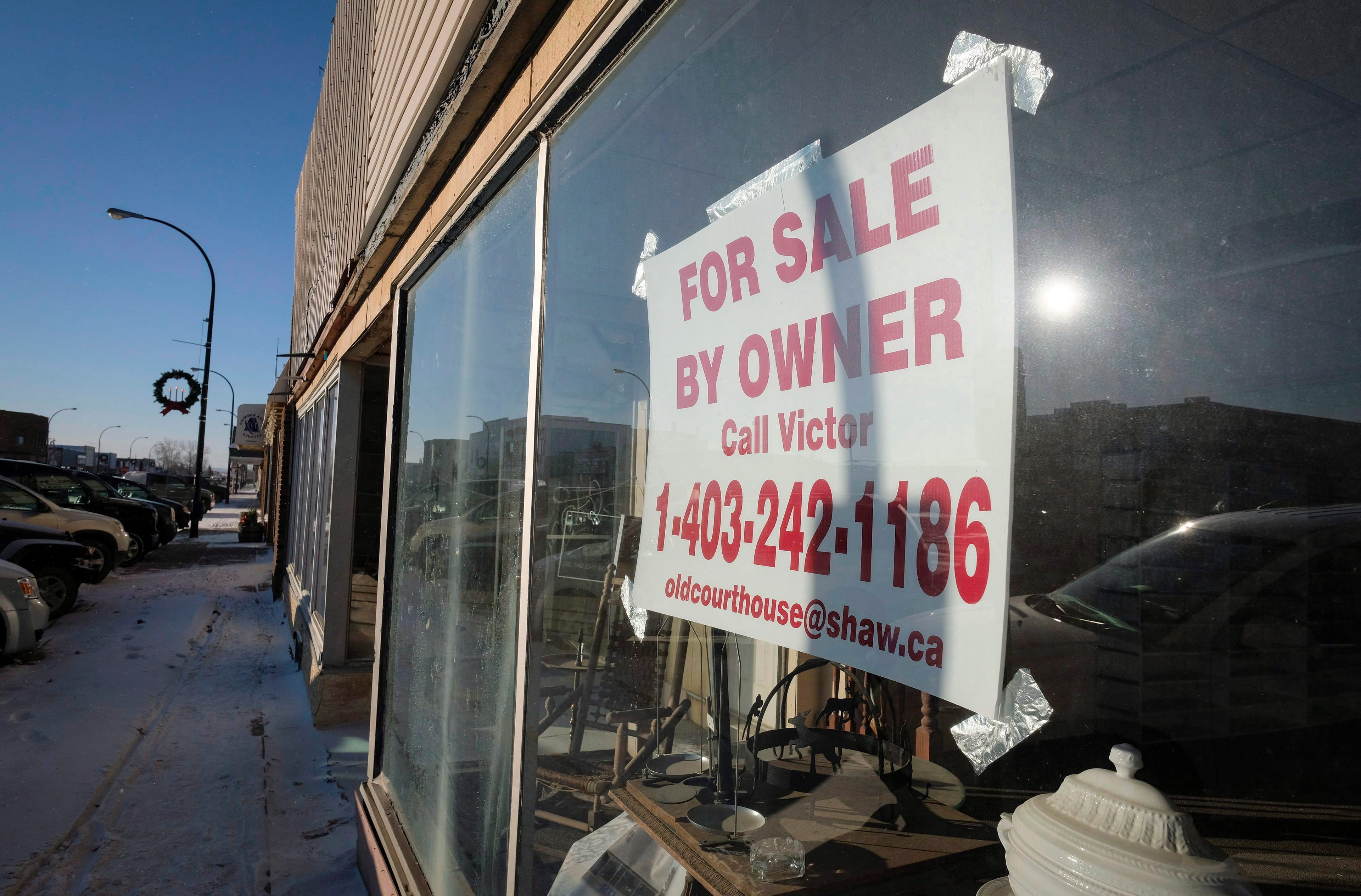 A vacant store for sale on the main street in Hanna, Alta. after the oil bust (Jeff McIntosh/CP)