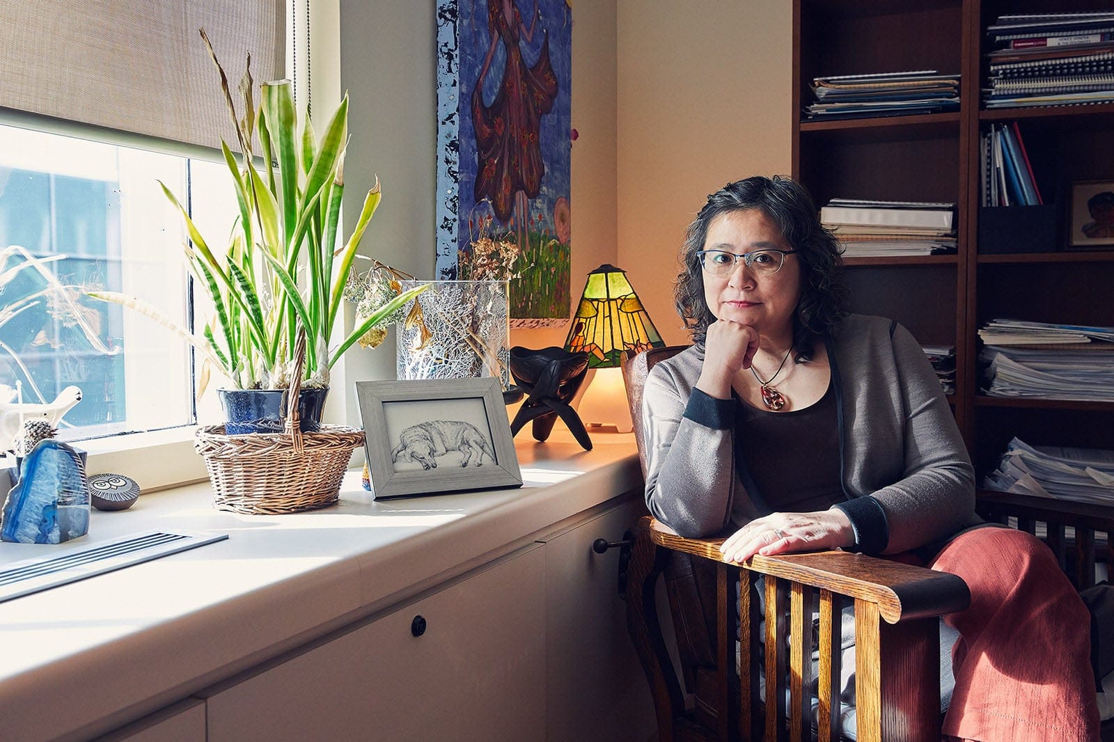 Dr Madeline Li in her Princess Margaret Hospital office, beside a framed drawing of her dog Hailey. (Photograph by Jaime Hogge)