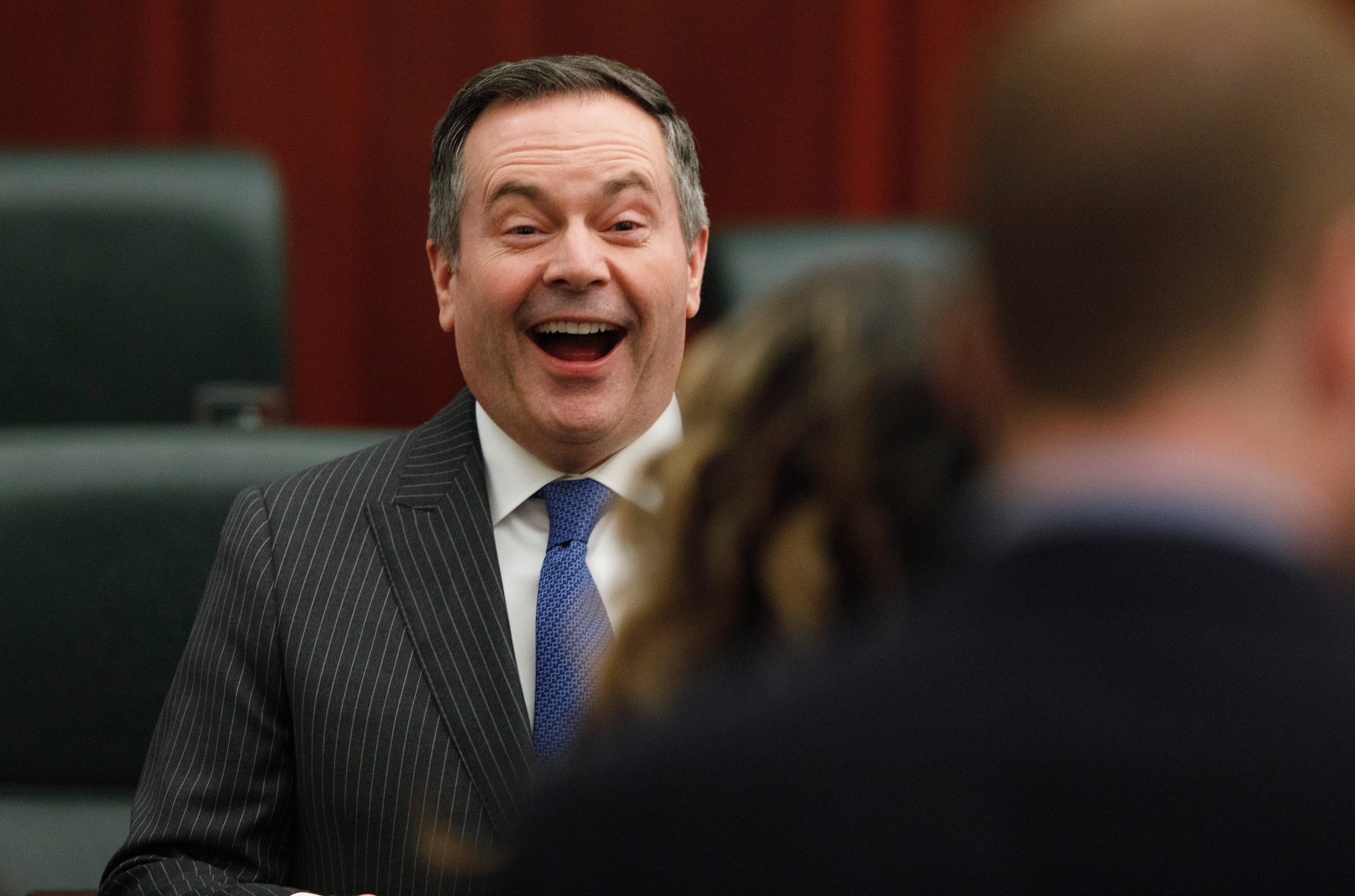 Kenney has a laugh after the Speech from the Throne in Edmonton on Feb. 25, 2020 (CP/Jason Franson)