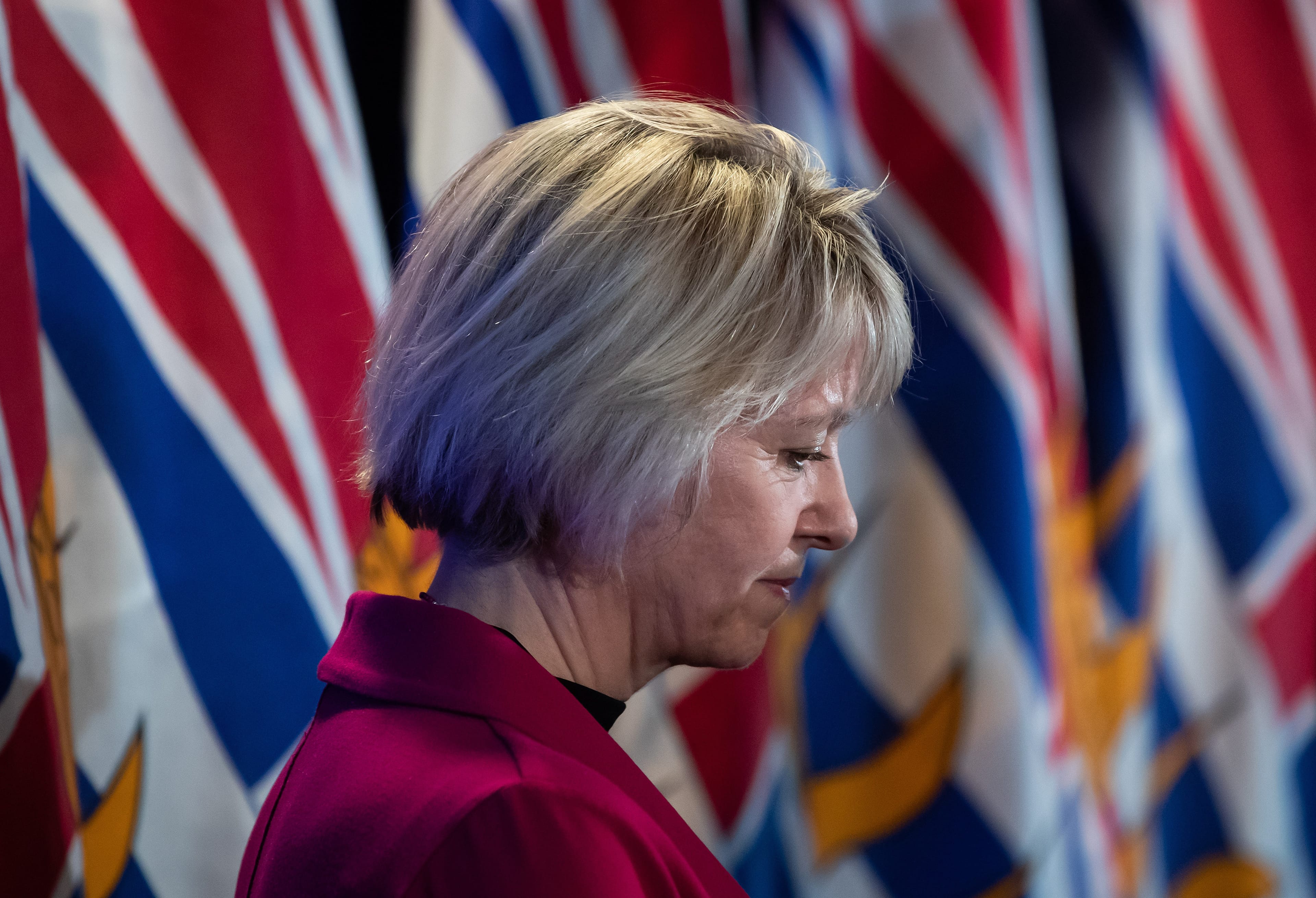 Dr. Bonnie Henry listens during a news conference on Friday about the provincial response to the coronavirus (Darryl Dyck/CP)