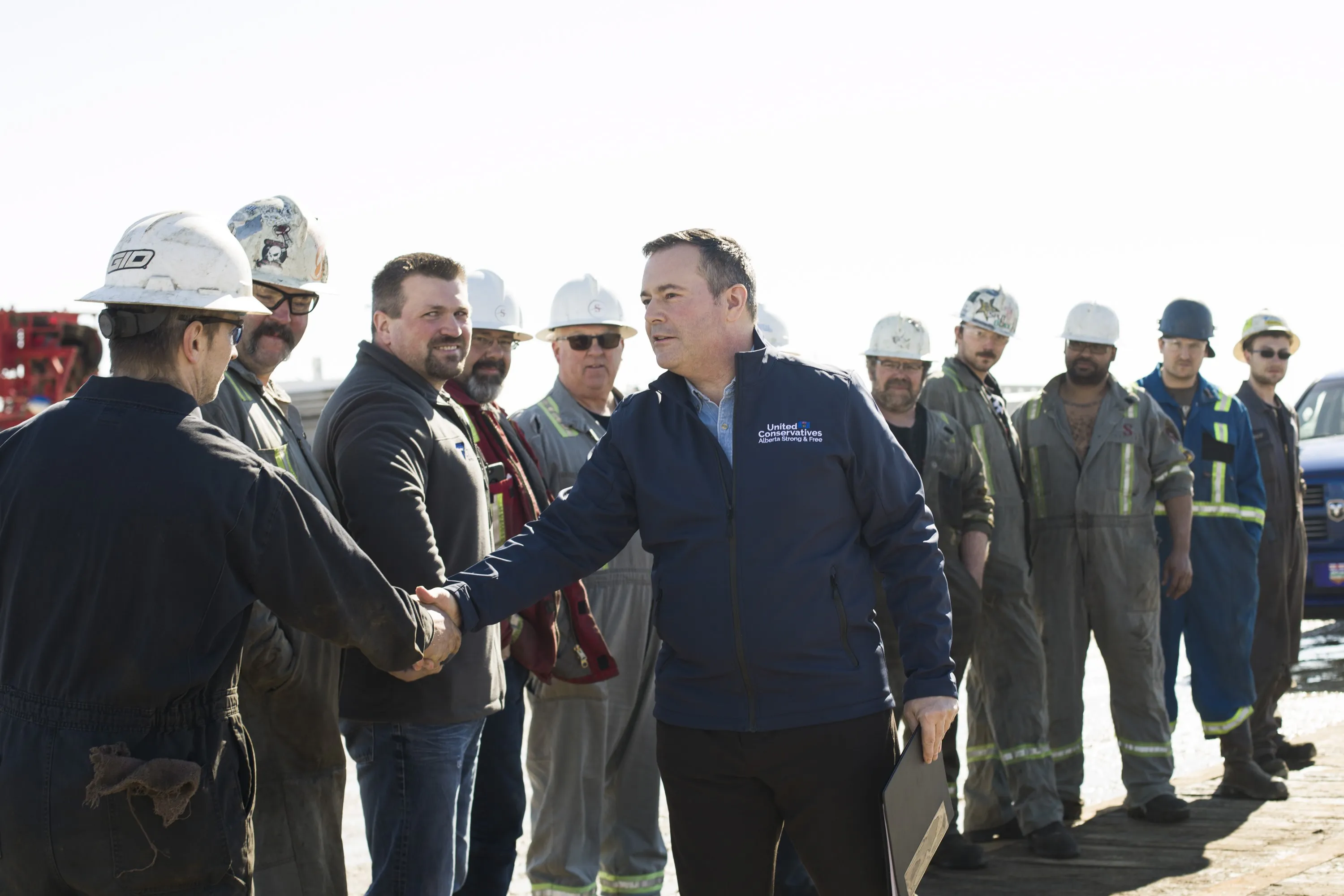 Kenney speaking with oilpatch workers in Leduc Alta. in March. (Amber Bracken/CP)