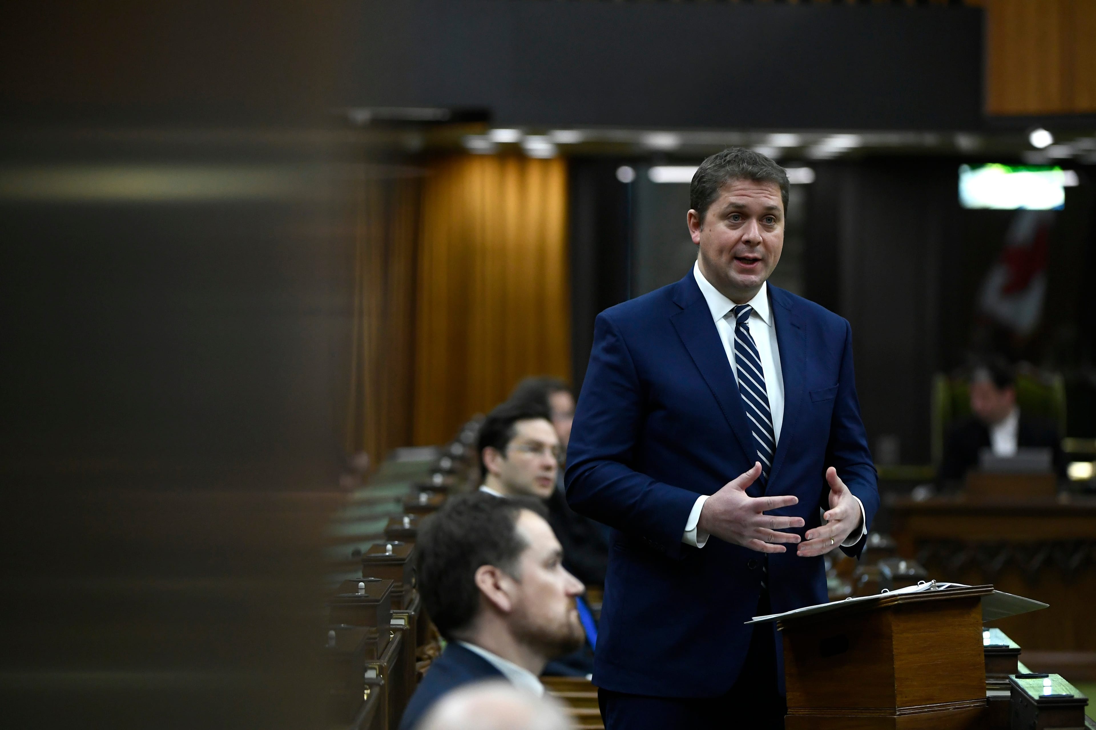 Scheer rises in the House of Commons, as Parliament was recalled to consider of measures related to the COVID-19 pandemic, on April 11, 2020 (CP/Justin Tang)