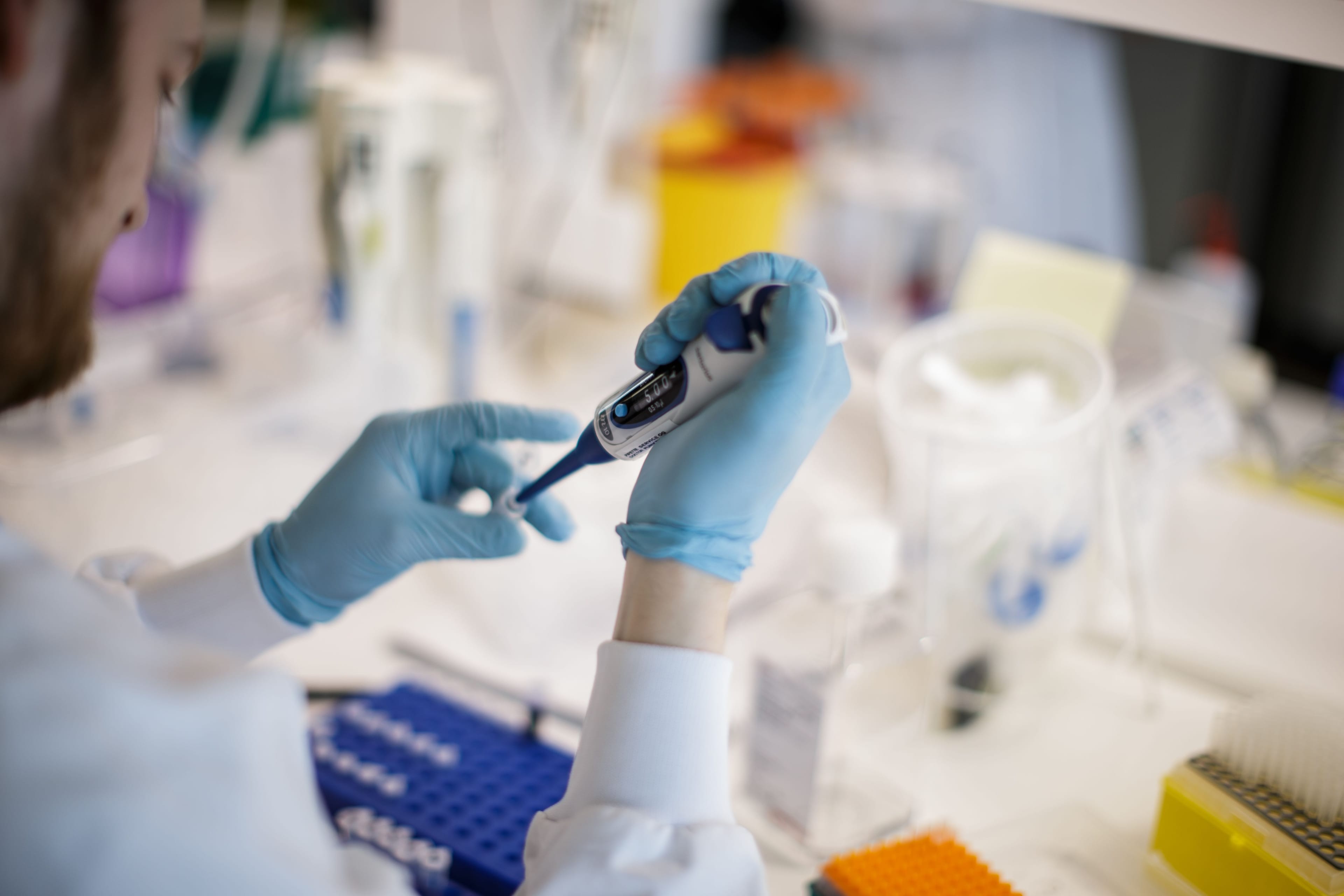 A researcher works on a COVID-19 vaccine at Copenhagen's University research lab in Copenhagen, Denmark, on March 23, 2020 (THIBAULT SAVARY/AFP via Getty Images)