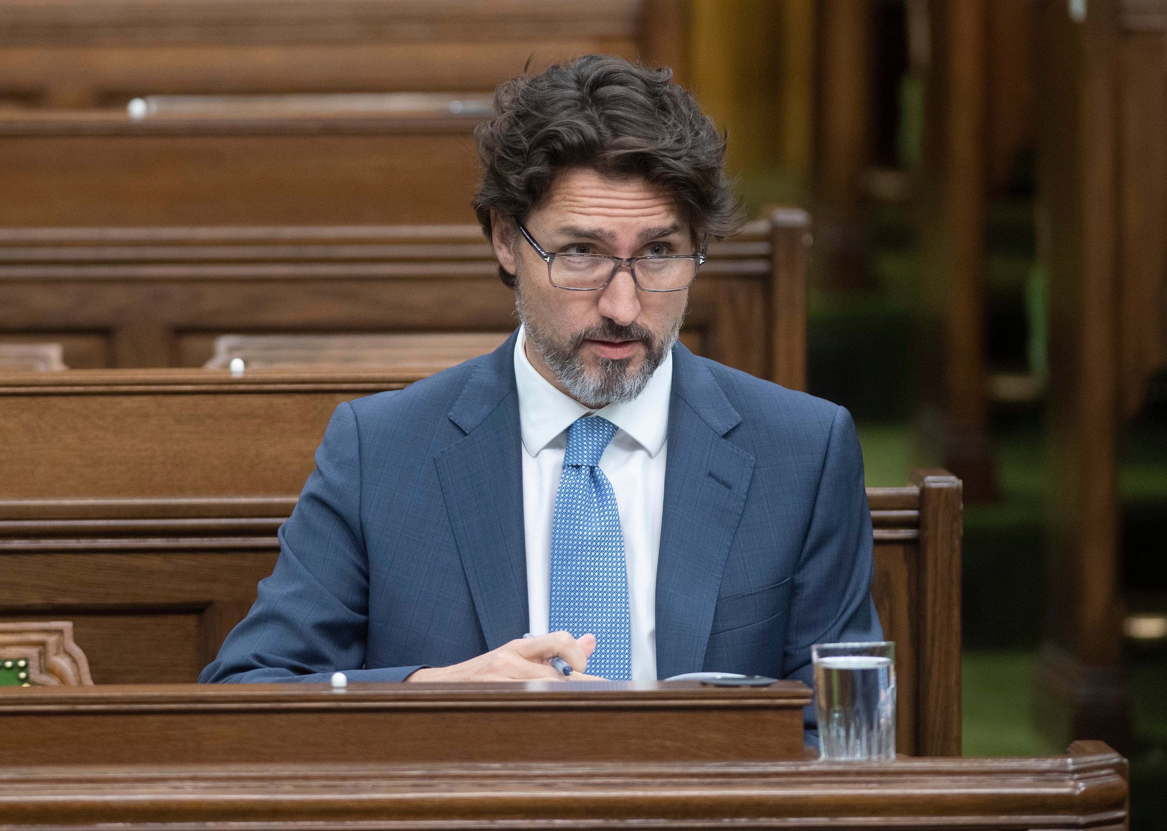 Trudeau waits for a session of the Special Committee on the COVID-19 Pandemic to begin in the House of Commons on May 13, 2020 (Adrian Wyld/CP)