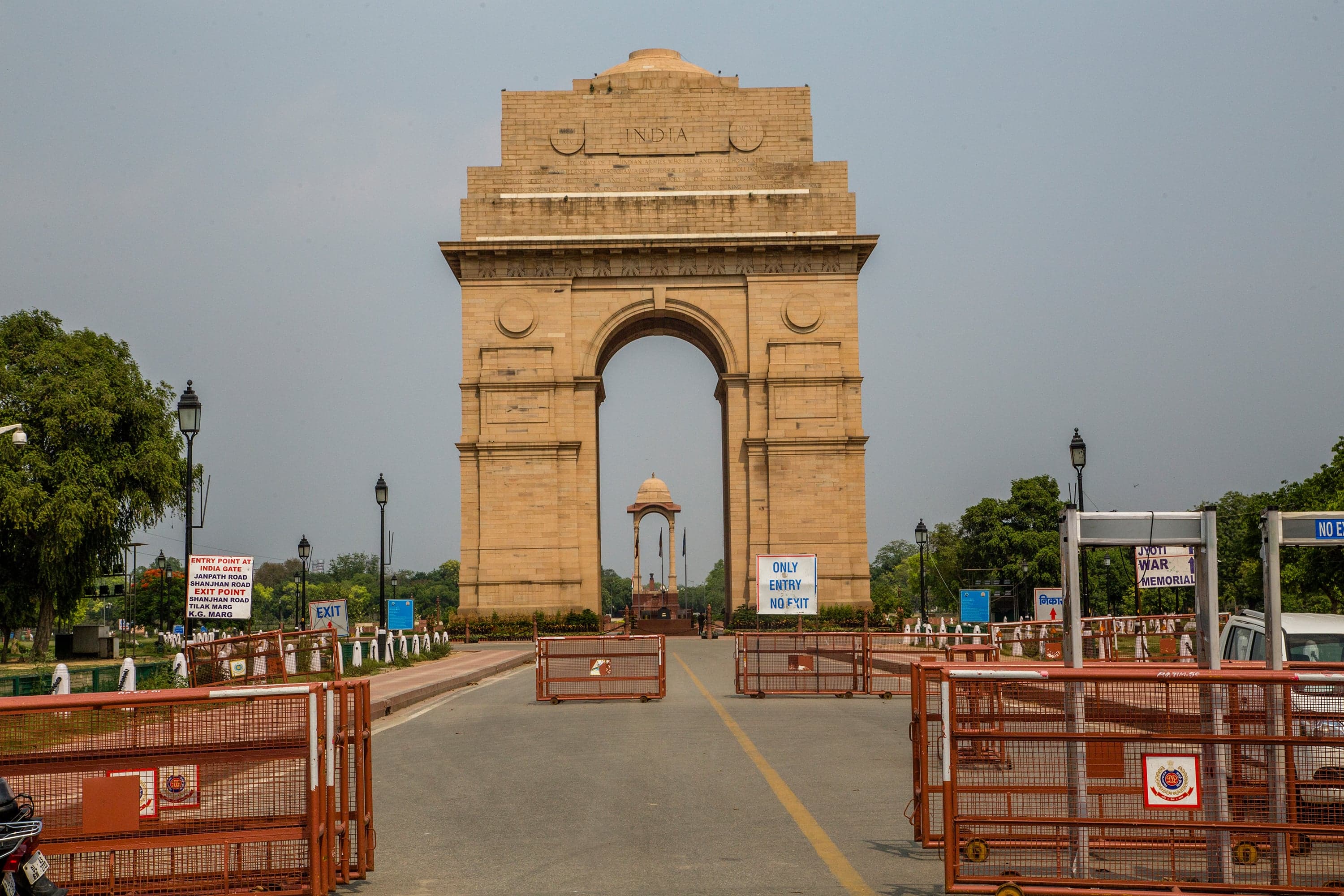 Barricades are kept by the Indian police in front of historic India Gate, as India remains under an unprecedented extended lockdown over the highly contagious coronavirus (COVID-19) on April 29, 2020 in New Delhi, India. India eased the lockdown restrictions by allowing neighbourhood shops and standalone shops in areas that havent been marked coronavirus hotspots to sell goods on the condition of 50 per cent staff strength and following other protective guidelines like wearing masks and maintaining social distance. With a total number of over 31,000 positive cases, the death toll due to coronavirus in India has reached 1008 as the country reels under a nationwide lockdown that was imposed on March 25 by the government. (Yawar Nazir/Getty Images)