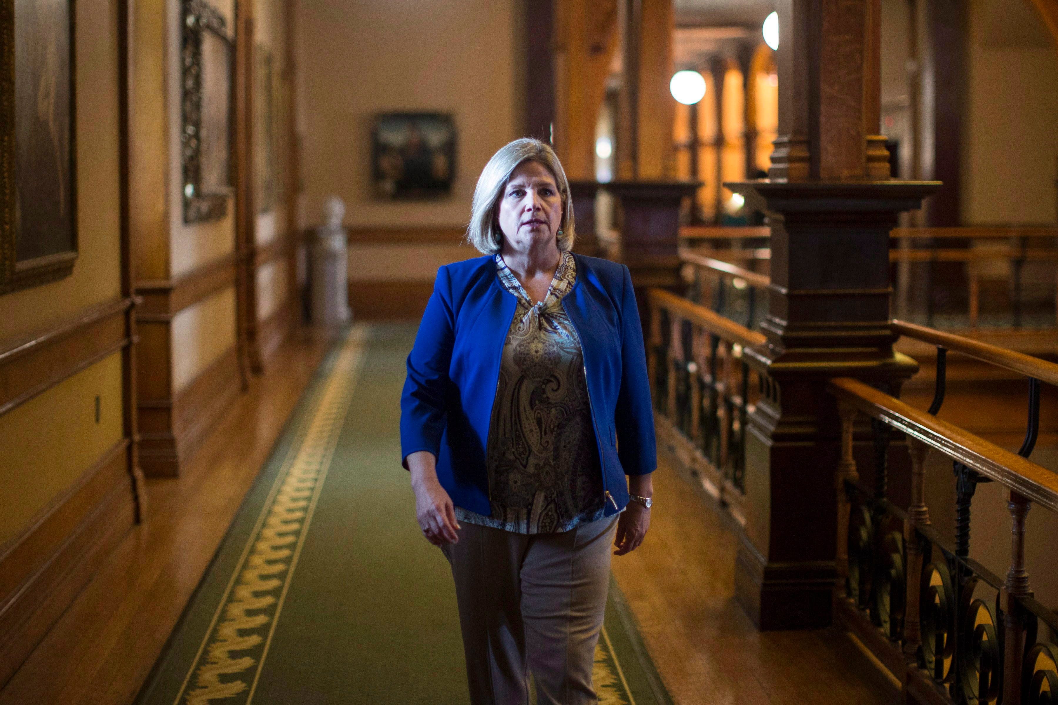 NDP Leader Andrea Horwath walks back to her office, following Question Period at the Ontario Legislature in Toronto on Aug. 1, 2018. (Chris Young/CP)