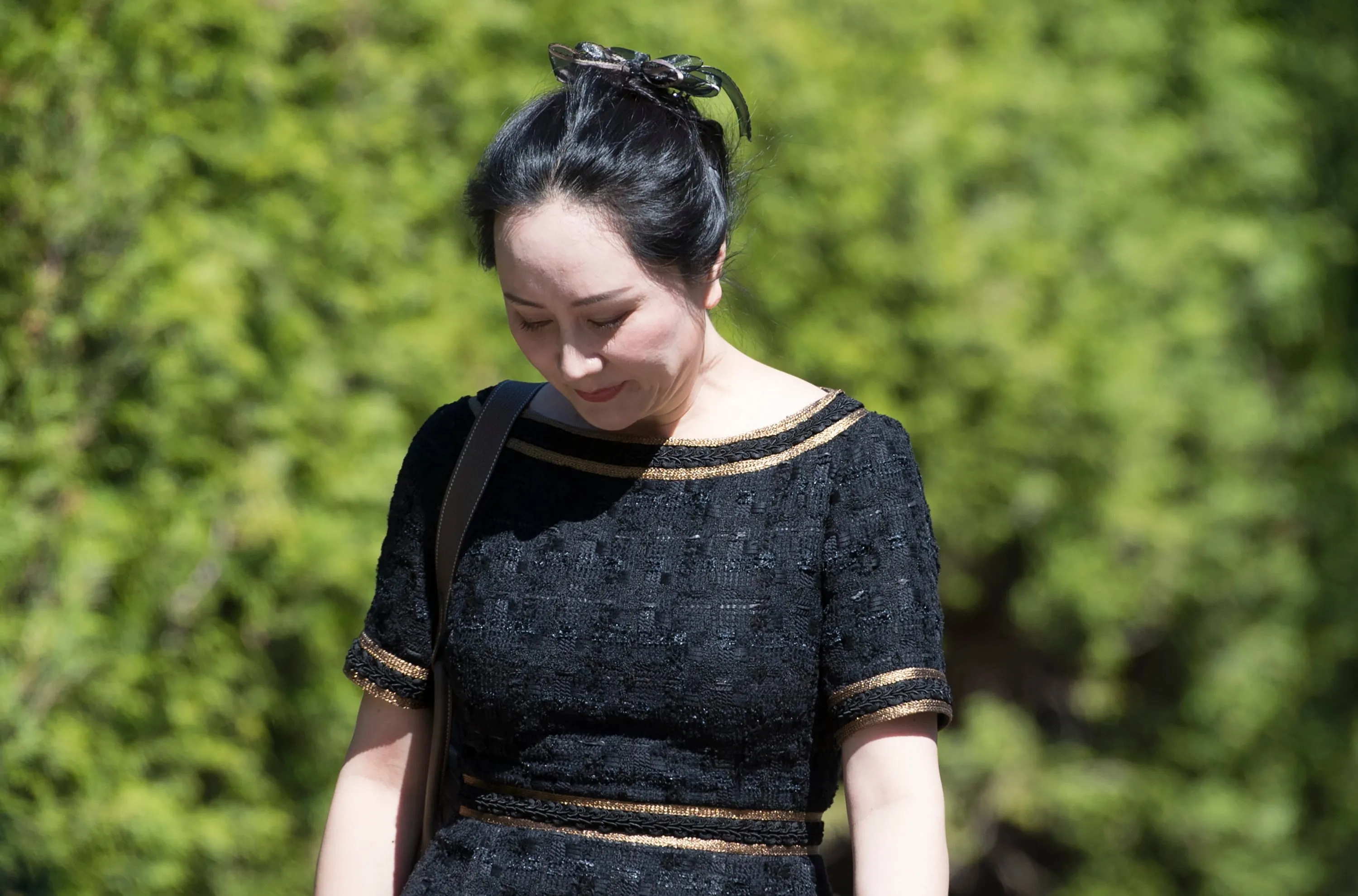 Meng leaves her home Wednesday to go to B.C. Supreme Court. (Jonathan Hayward/CP)