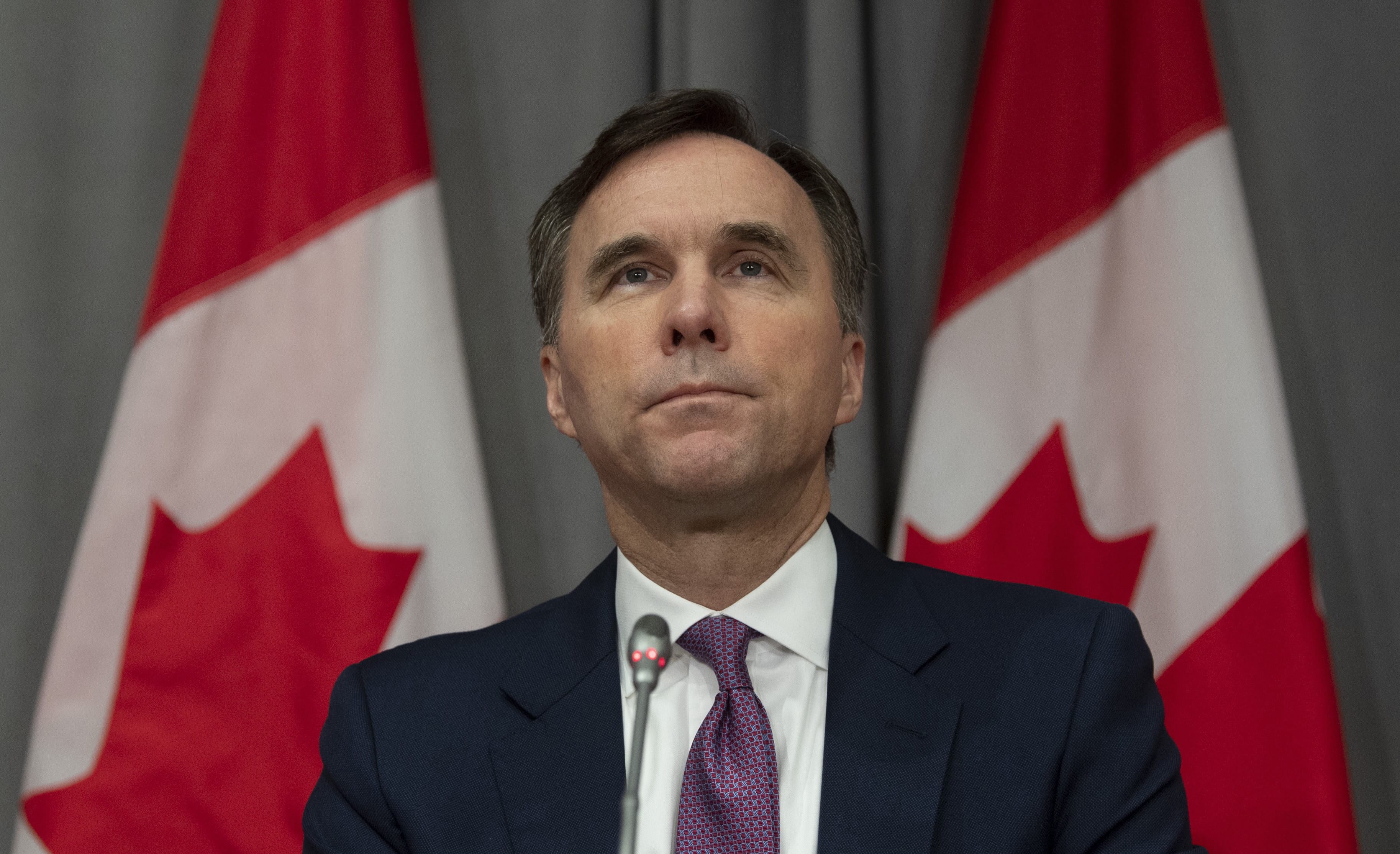Minister of Finance Bill Morneau listens to a question during a news conference Friday May 1, 2020 in Ottawa. (Adrian Wyld/CP)