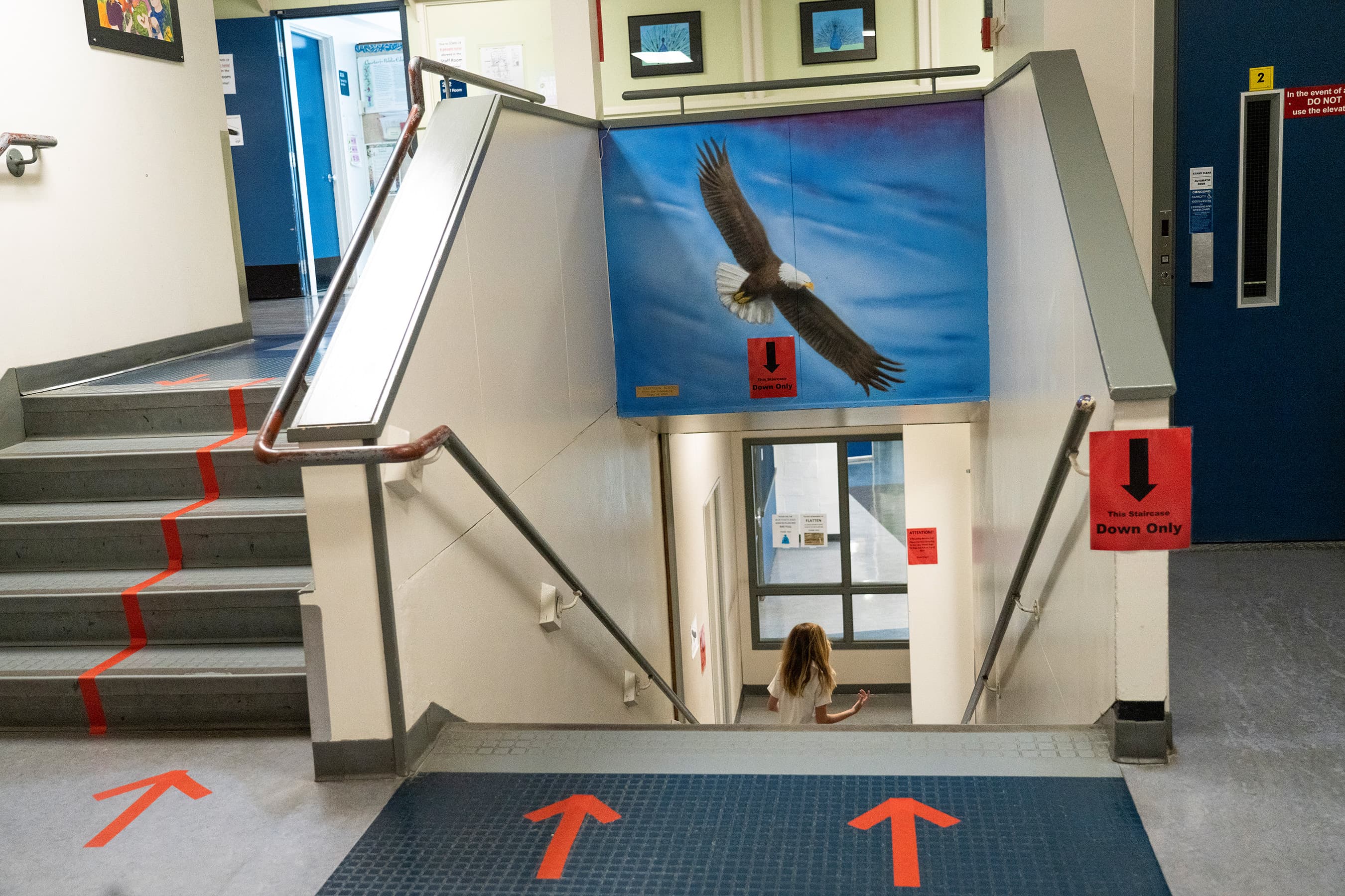 Arrows on the floor help maintain social distancing (Photograph by Jimmy Jeong)