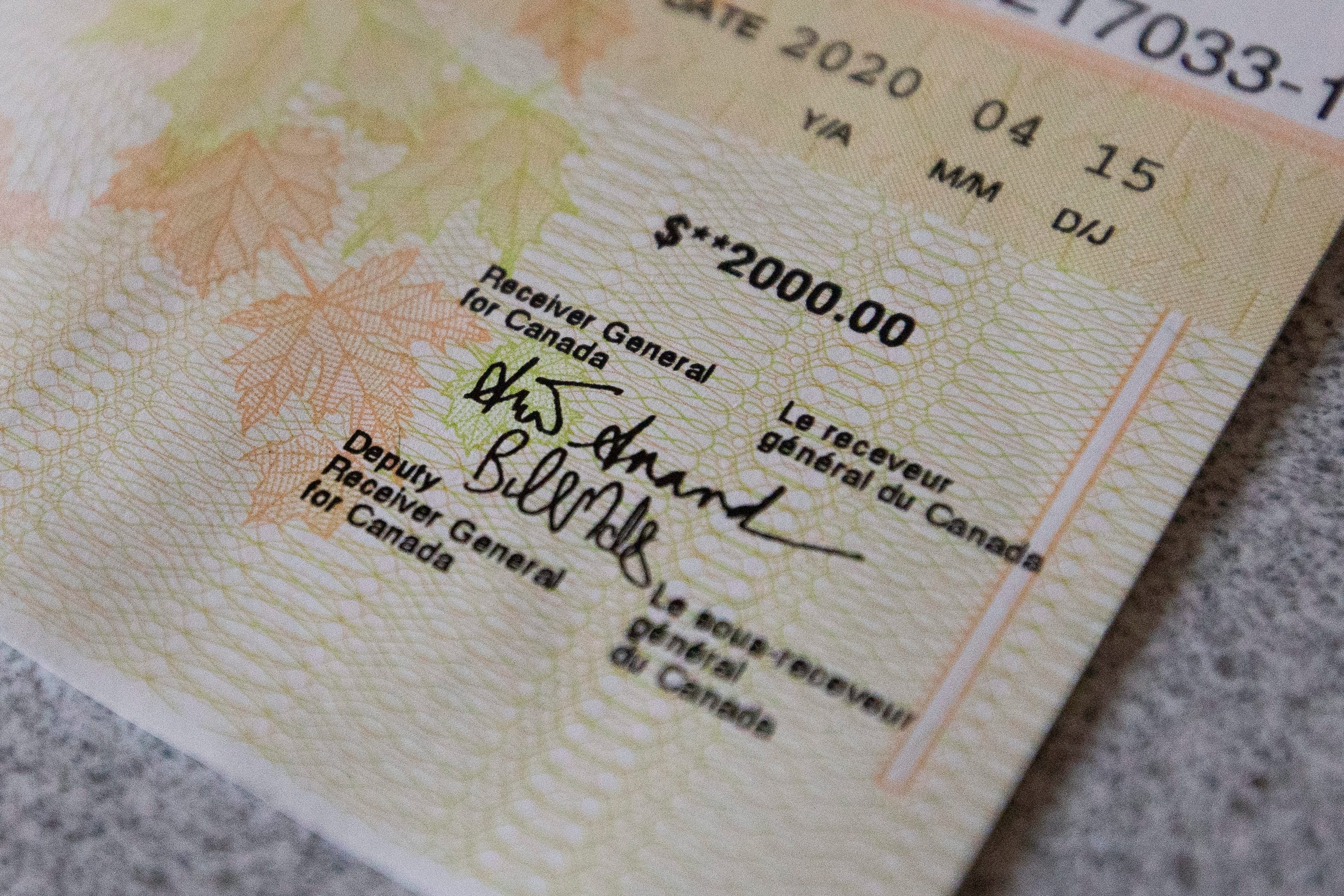 A $2000 Canada Emergency Response Benefit cheque is pictured in Kingston, Ontario on Wednesday, April 22, 2020. THE CANADIAN PRESS IMAGES/Lars Hagberg