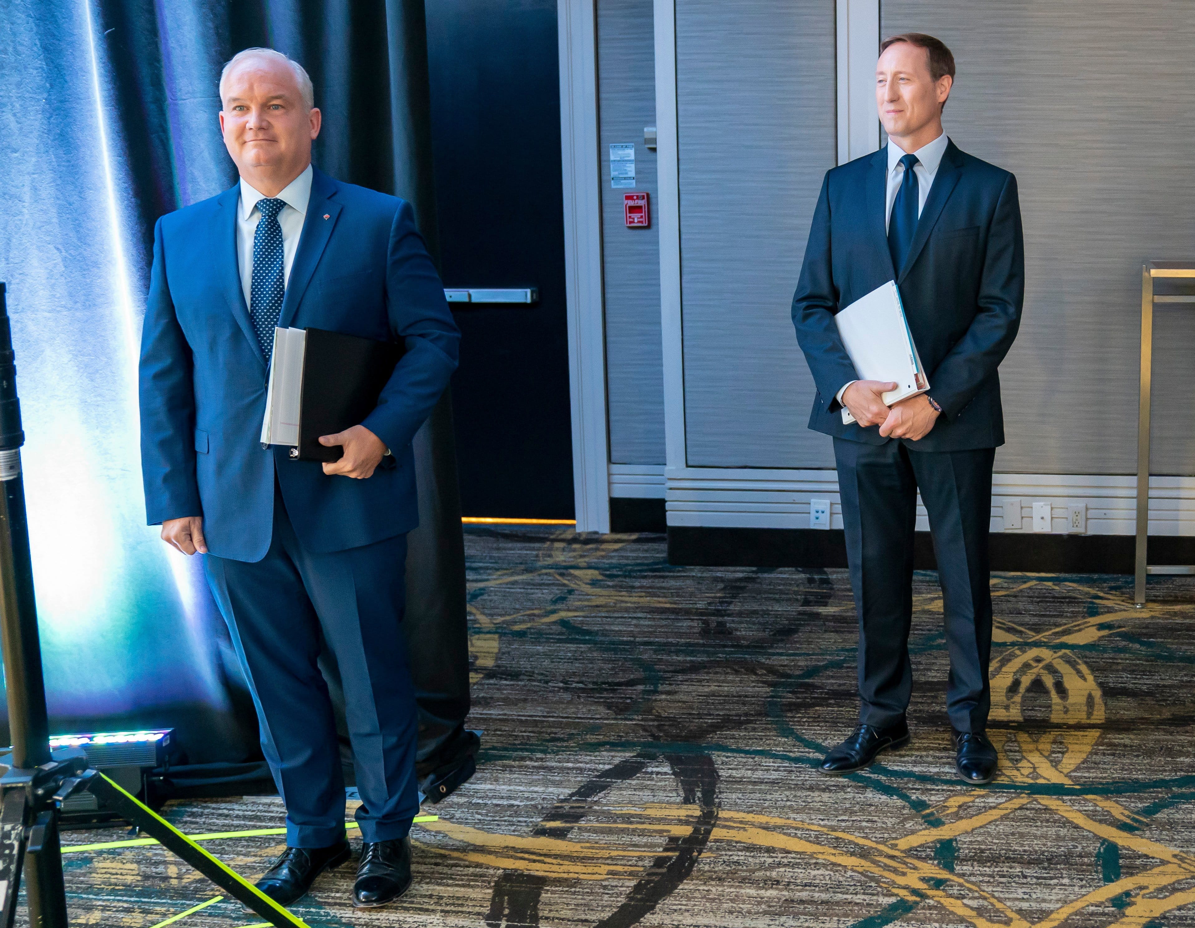 Conservative Party of Canada leadership candidates Erin O'Toole and Peter MacKay wait for the start of the French Leadership Debate in Toronto on Wednesday, June 17, 2020. (Frank Gunn/CP)