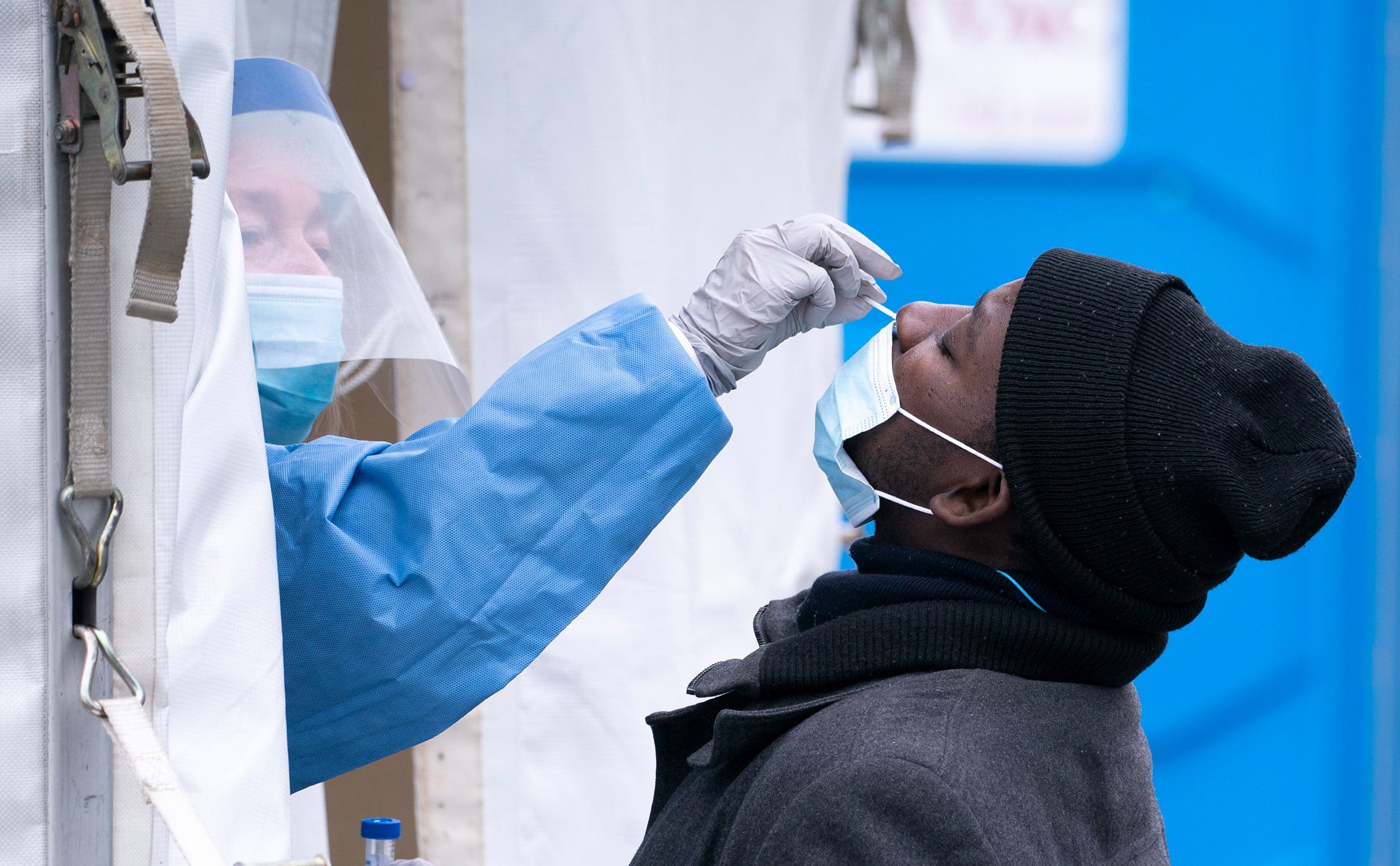 A man is tested at a temporary COVID-19 test clinic in Montreal, on Friday, May 15, 2020. (Paul Chiasson/CP)