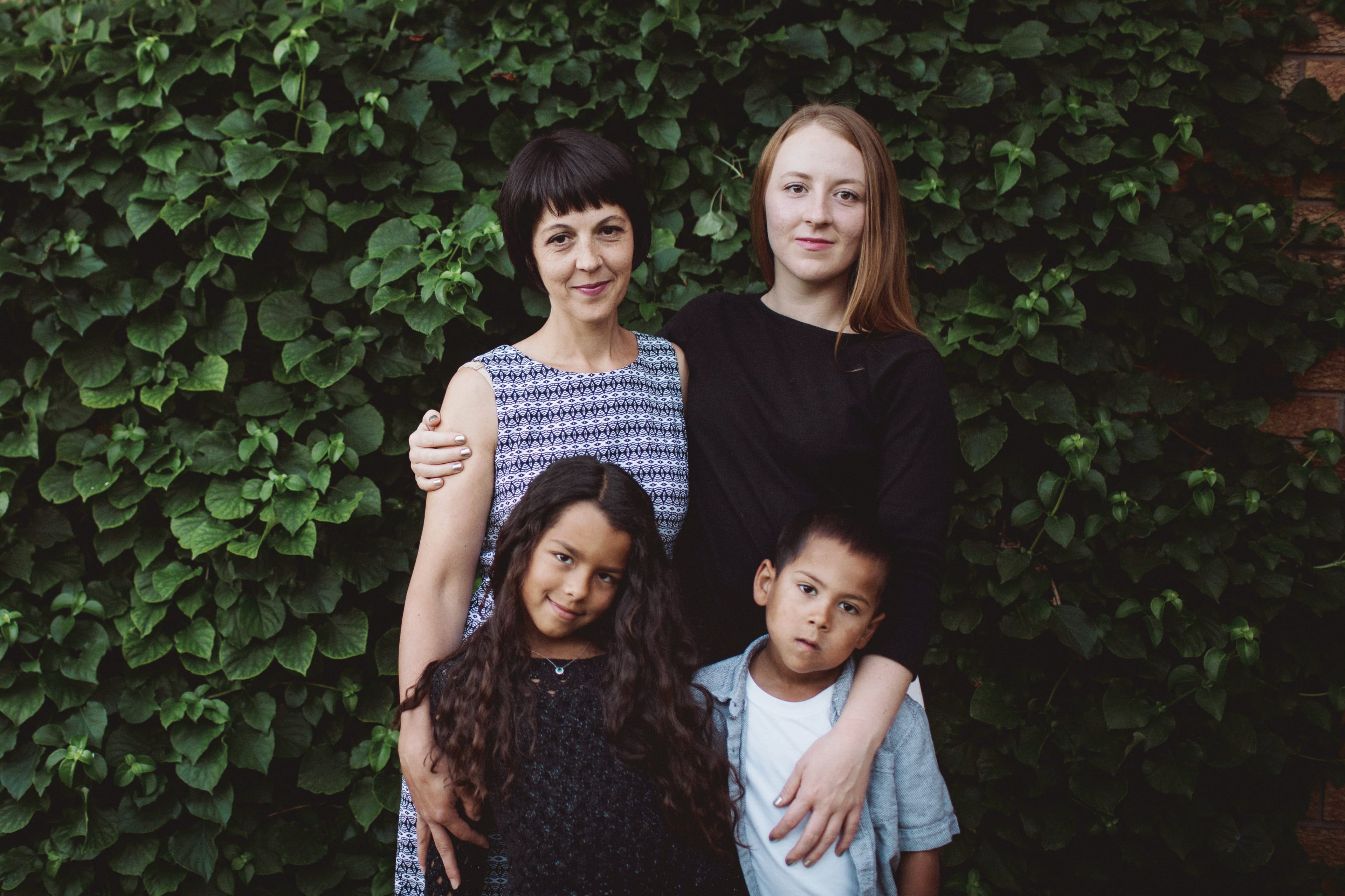 Heather Ramey is grieving the loss of her husband Dave Varghese along with her three children Tonia, 26, Suriya, 8, and Elijah, 5. They were unable to visit Varghese in the hospital because of restrictions to prevent the spread of COVID-19, even though he did not have the virus. (Photograph by Chloë Ellingson)