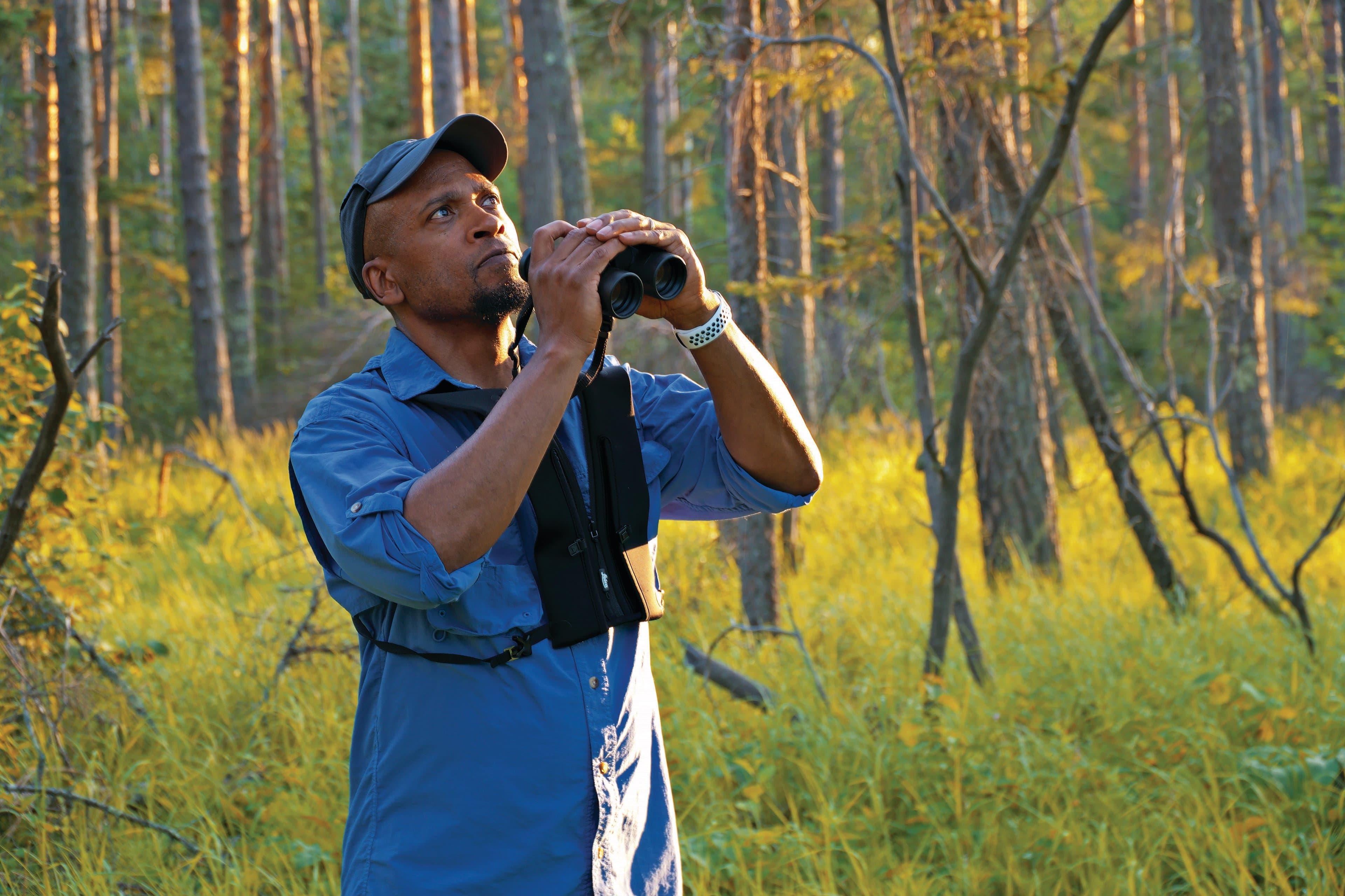 Edmondson birding at the Hawk Ridge nature reserve (Photograph by Dudley Edmondson)