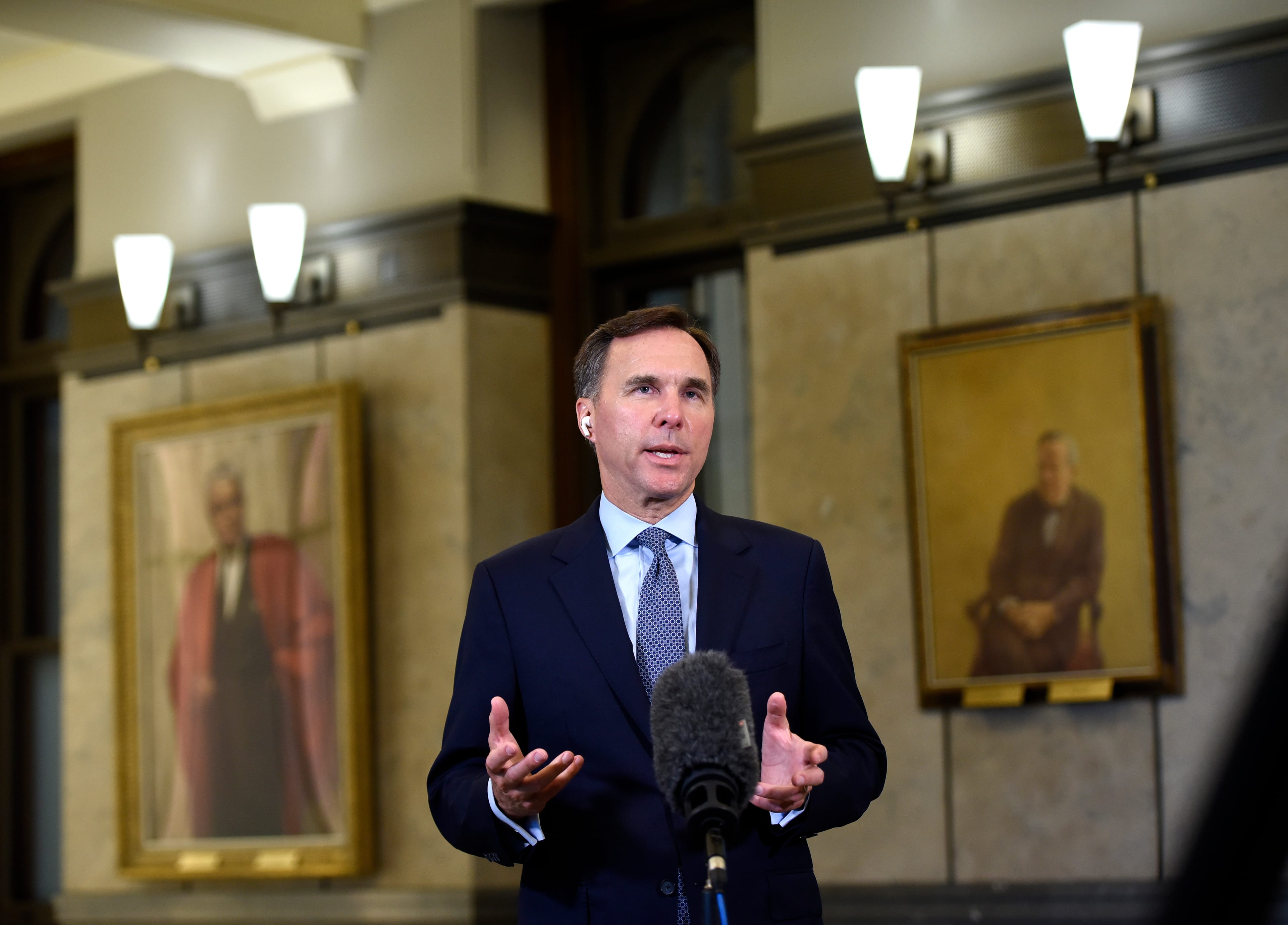 Minister of Finance Bill Morneau participates in a remote TV interview in the Foyer of the House of Commons on Parliament Hill on July 8, 2020. (Justin Tang/CP)