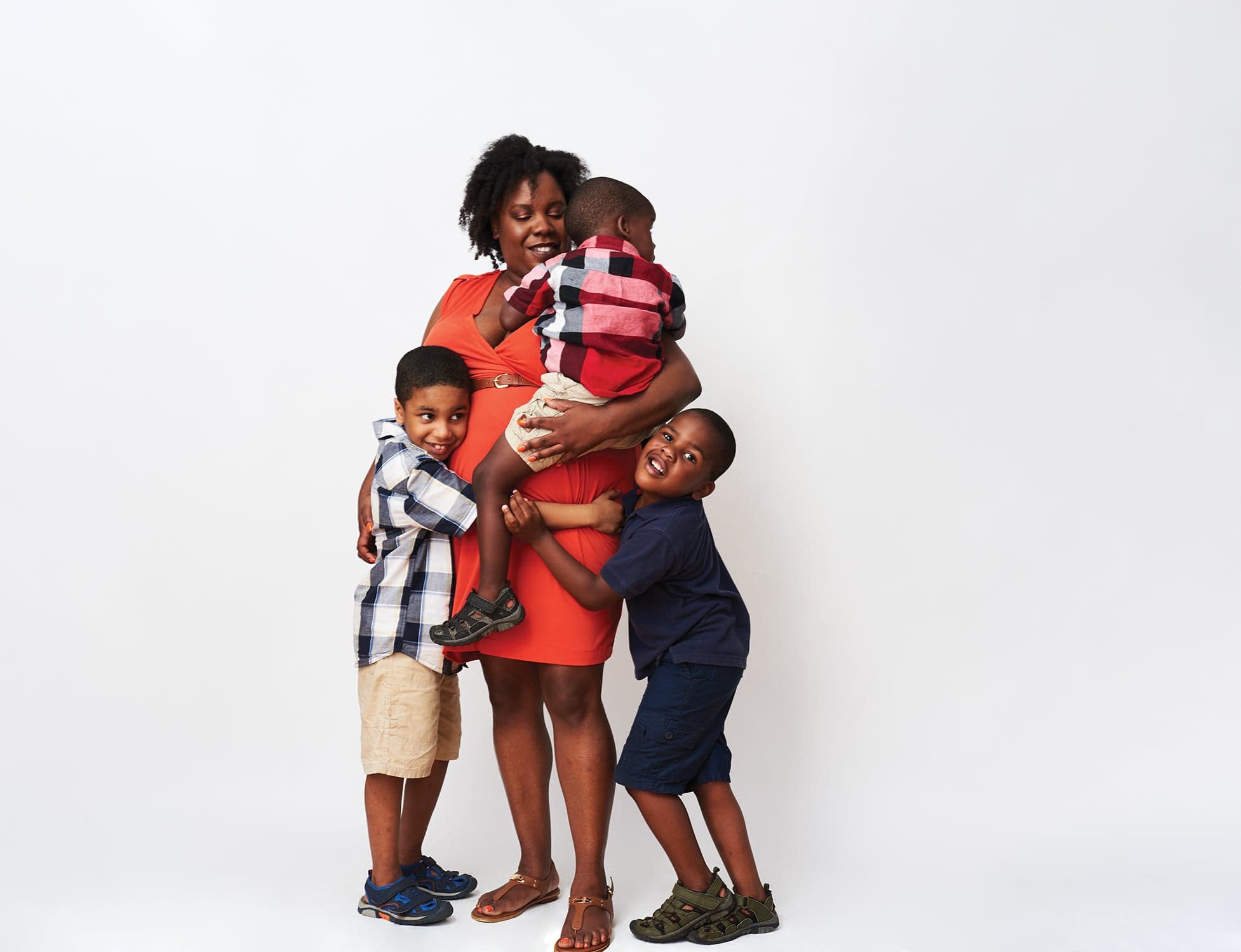 Natalie Donaldson with her kids Isaiah, 7, Joshua, 4, and Eli, 2. (Photograph by Dimitri Aspinall)