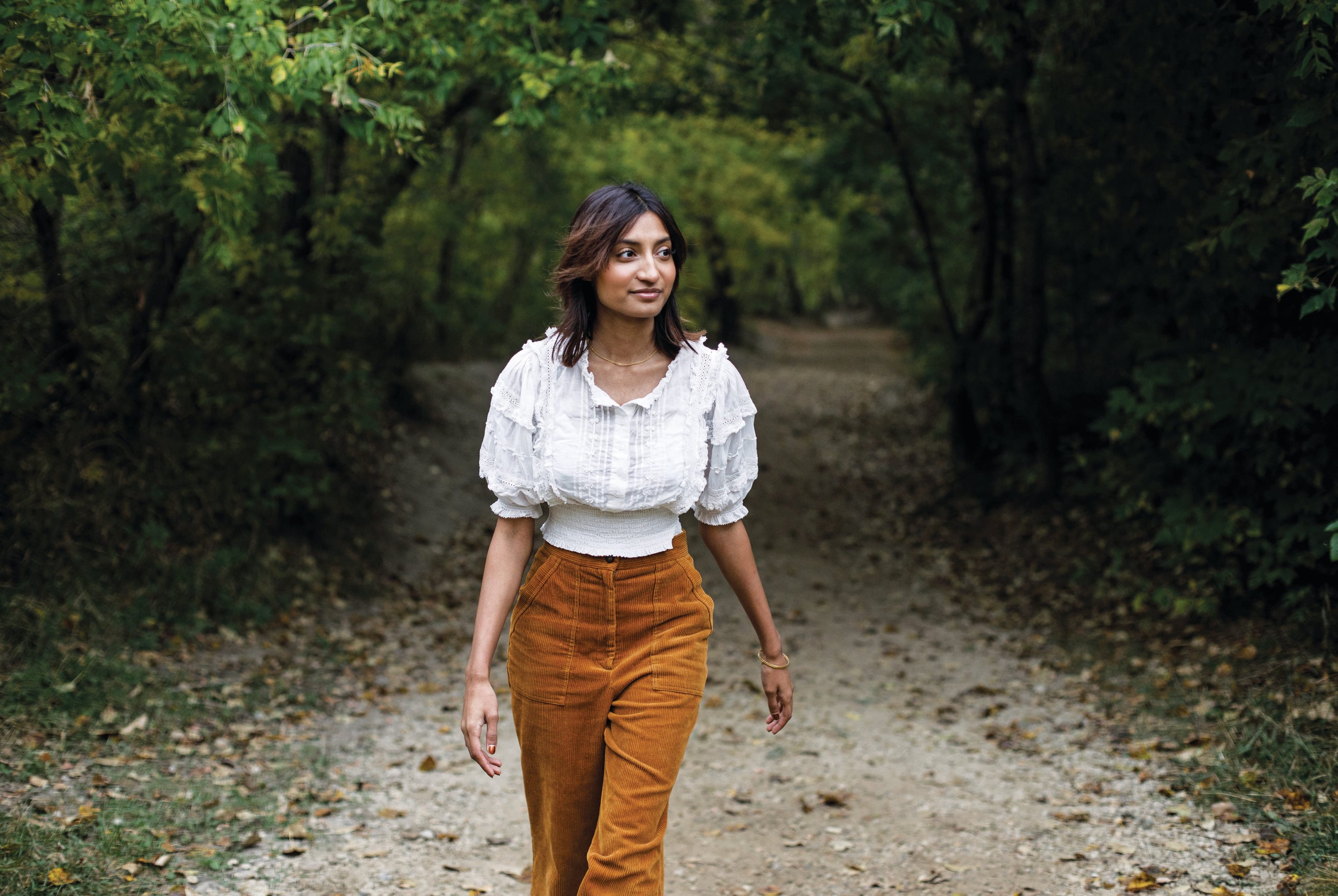 University of Alberta Arts Degree graduate, Anusha Kav pictured in the river valley in Edmonton, Alberta. (Photograph by Jason Franson)