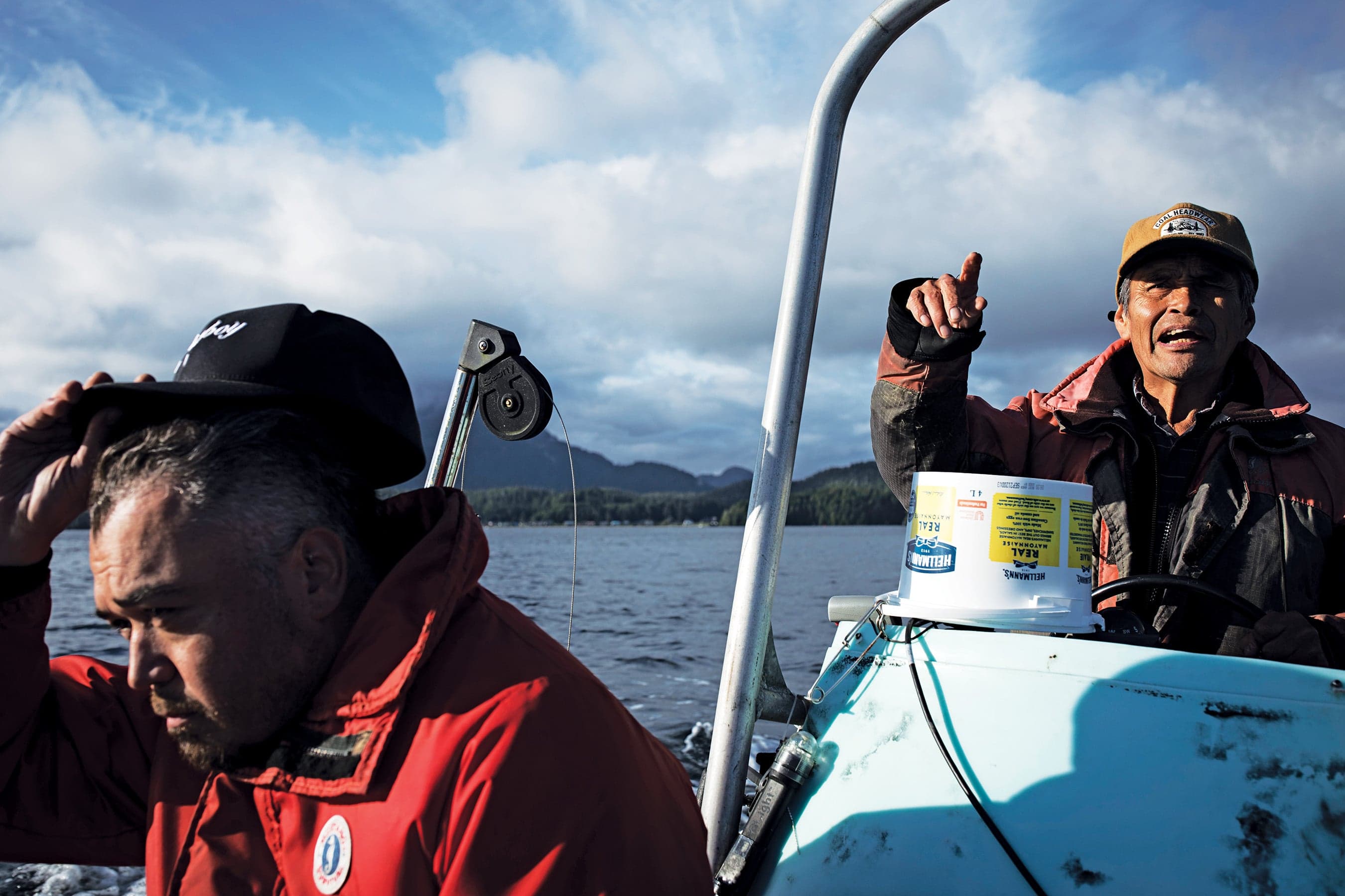 Martin (right) and friend Edward R. Johnson on the lookout for otters in the Tofino harbour (Photograph by Melissa Renwick)