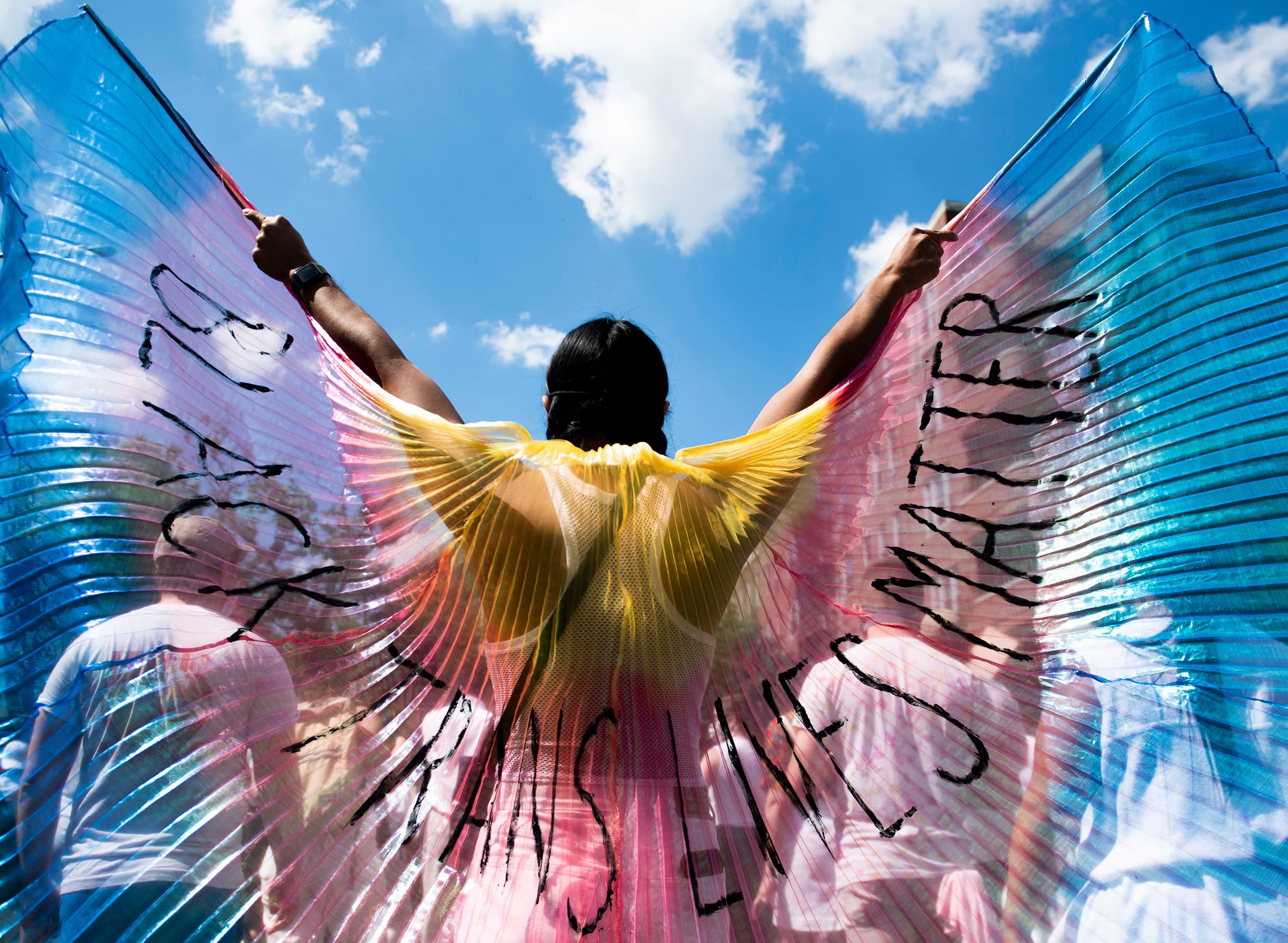A protester unfurls wings during a Black Lives Matter march on June 14 in New York City (Michael Noble Jr./Getty Images)