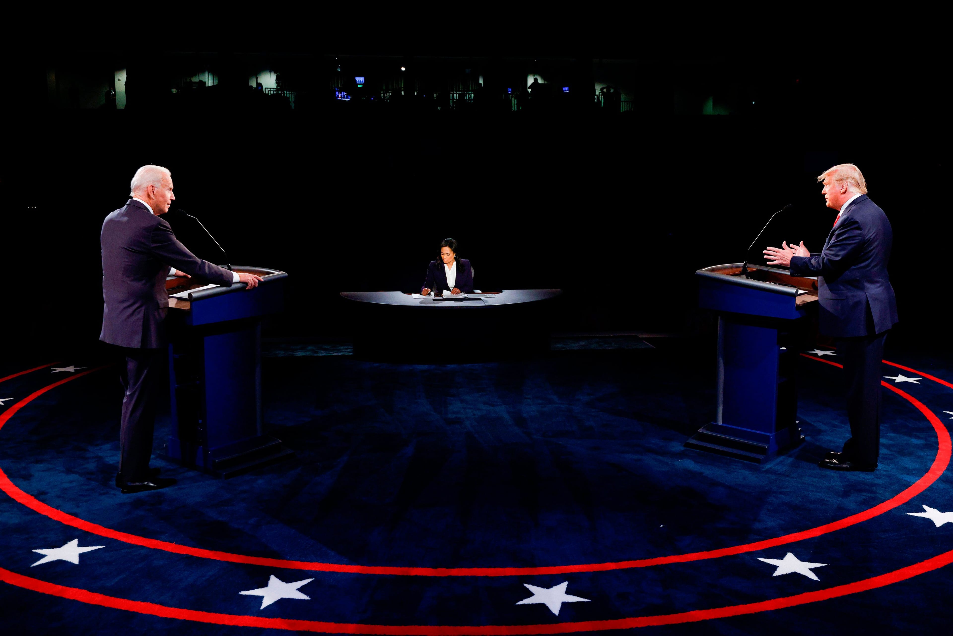 Trump and Biden participate in the final presidential debate at Belmont University in Nashville, Tenn., on Oct. 22, 2020 (Jim Bourg/AFP/Getty Images)