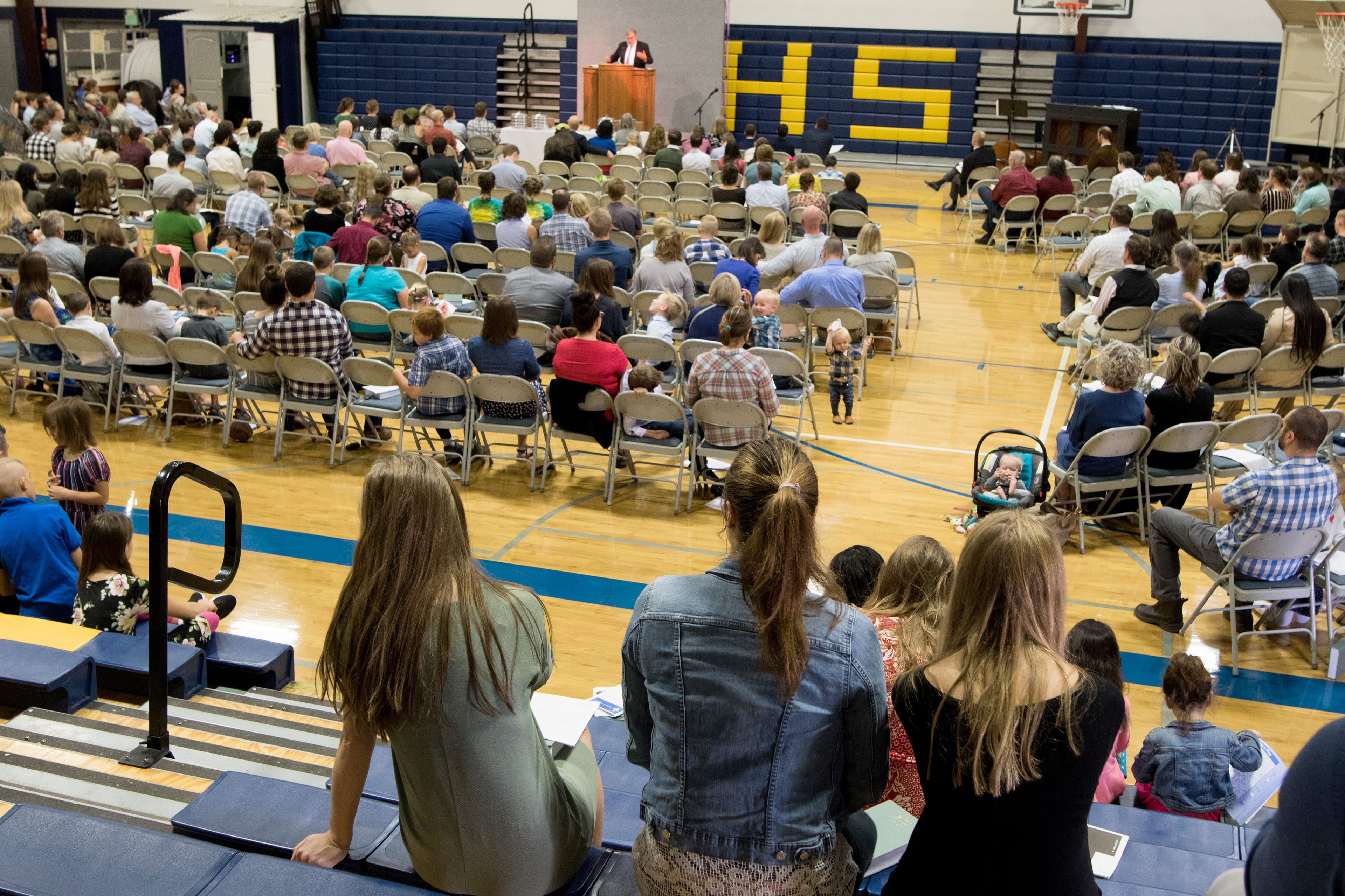 Moscow, Idaho Worshippers listen to Pastor Doug Wilson's sermon at the Logos School. The topic of this day was biblical prophecy and the destruction of Jeruslaem in 70 CE. Wilson argues God regularly passes judgment on humanity and the latest - the end of liberal secularism, is happening now. (Photograph by Adnan R. Khan)