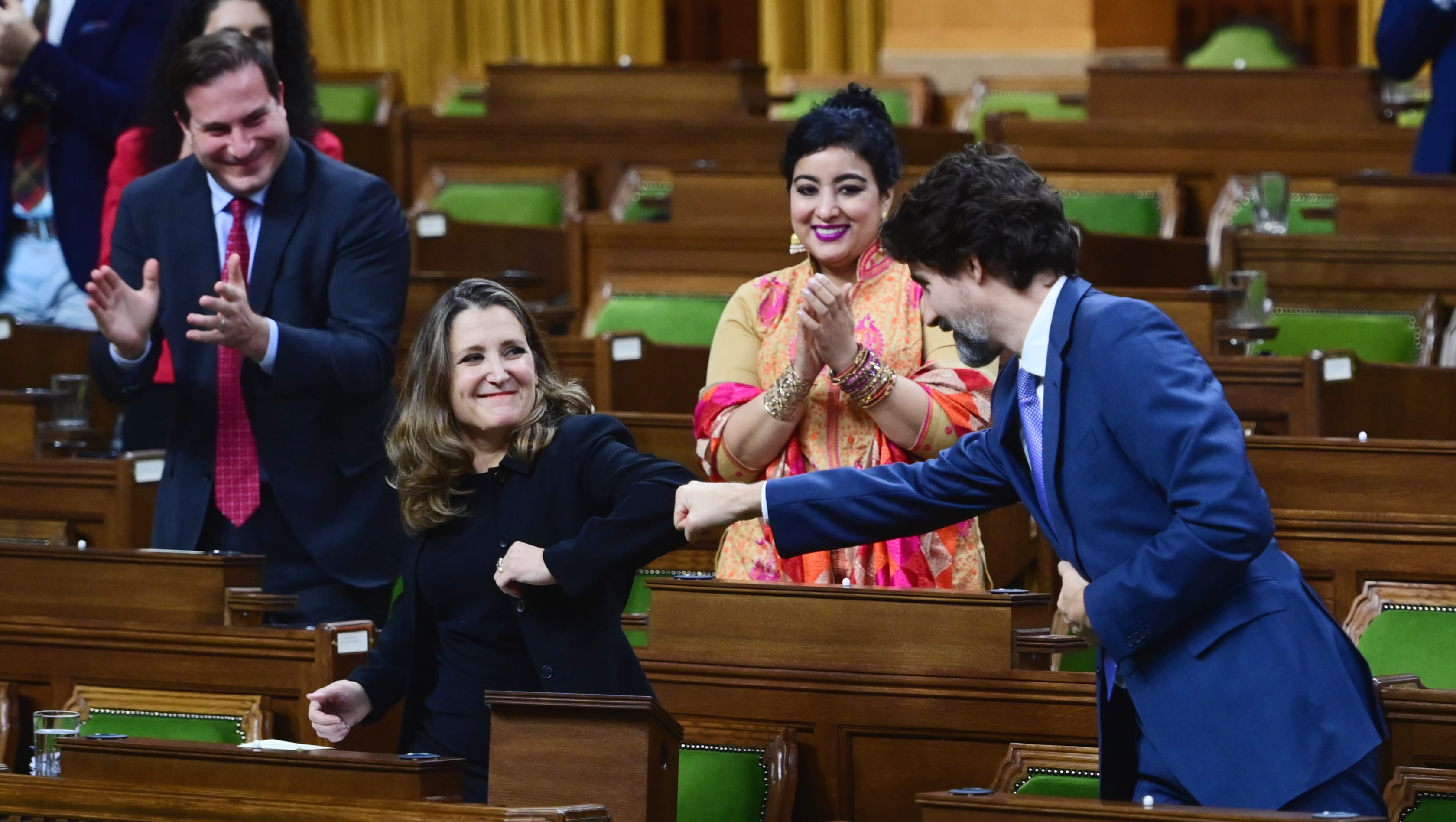 Minister of Finance Chrystia Freeland gets a fist bump from Prime Minister Justin Trudeau after delivering the 2020 fiscal update in the House of Commons on Parliament Hill in Ottawa on Monday, Nov. 30, 2020. (Sean Kilpatrick/CP)