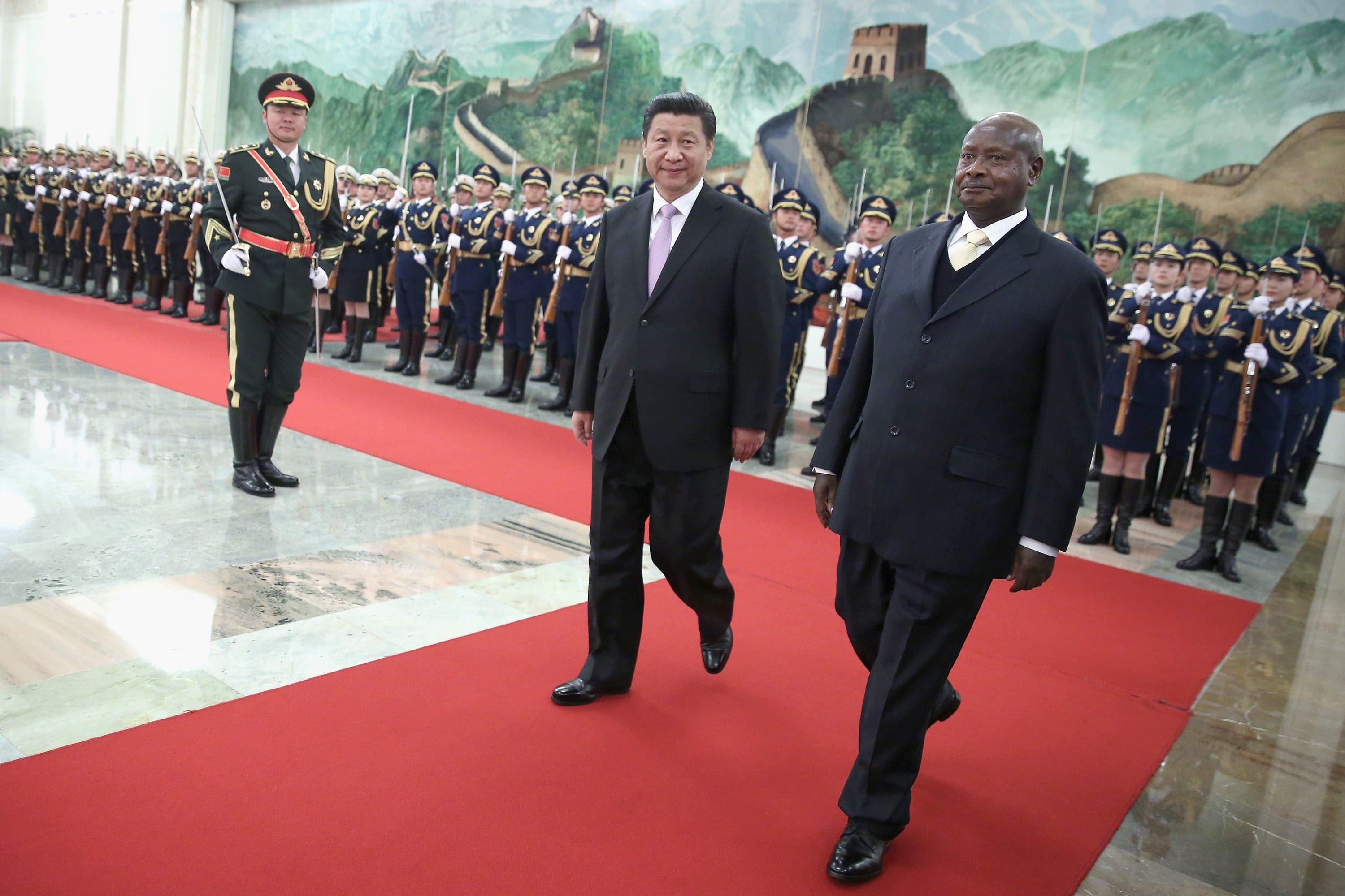 Uganda’s Museveni (right), with China’s Xi Jinping in 2015, has been in power for 34 years (Feng Li/Getty Images)