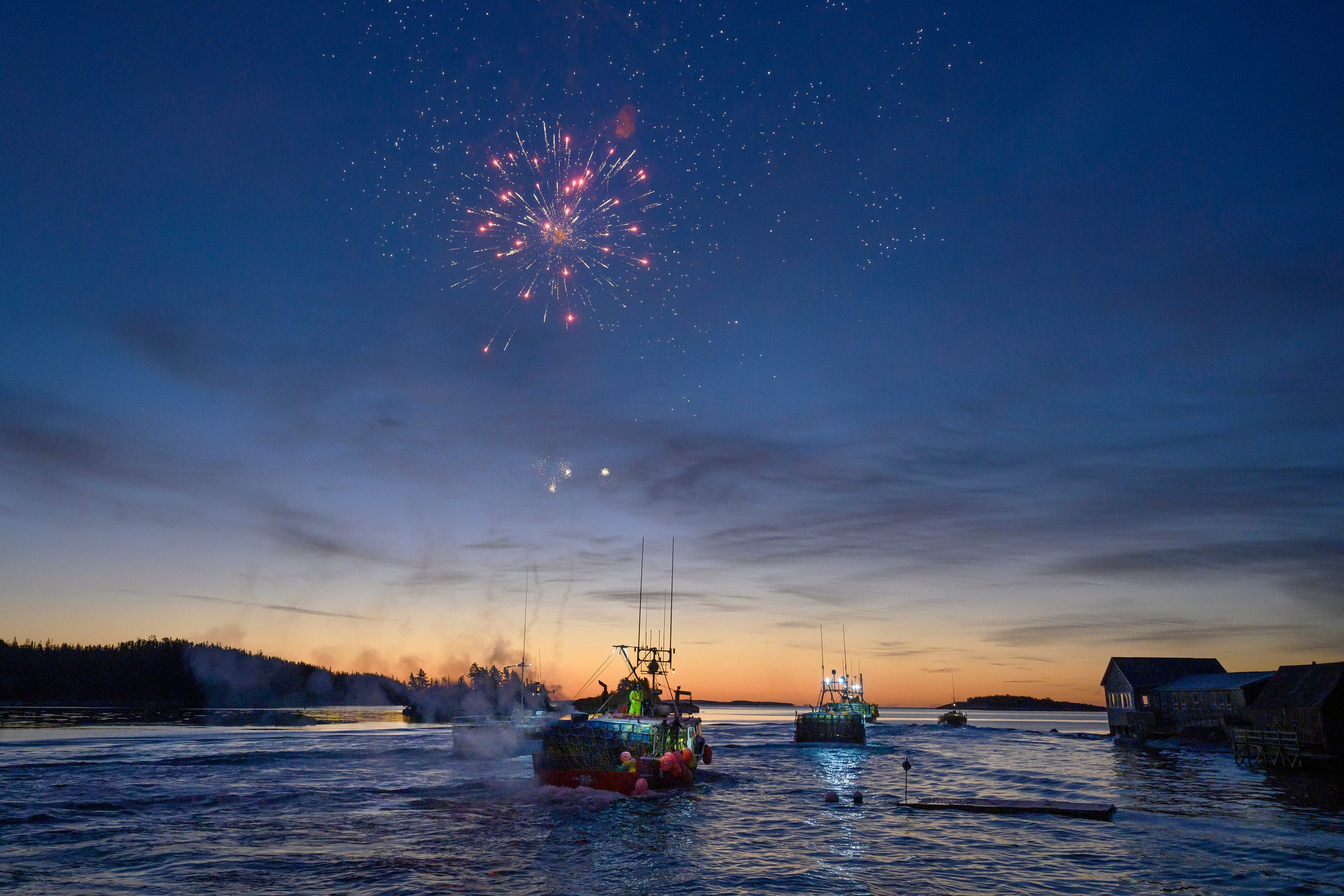 Fireworks are fired from a lobster boat as fishers leave the West Dover wharf at first light on Dumping Day Monday, November 30, 2020 - marking the beginning of the lucrative commercial lobster season in LFA 33/34 on the South Shore of Nova Scotia. (Darren Calabrese)