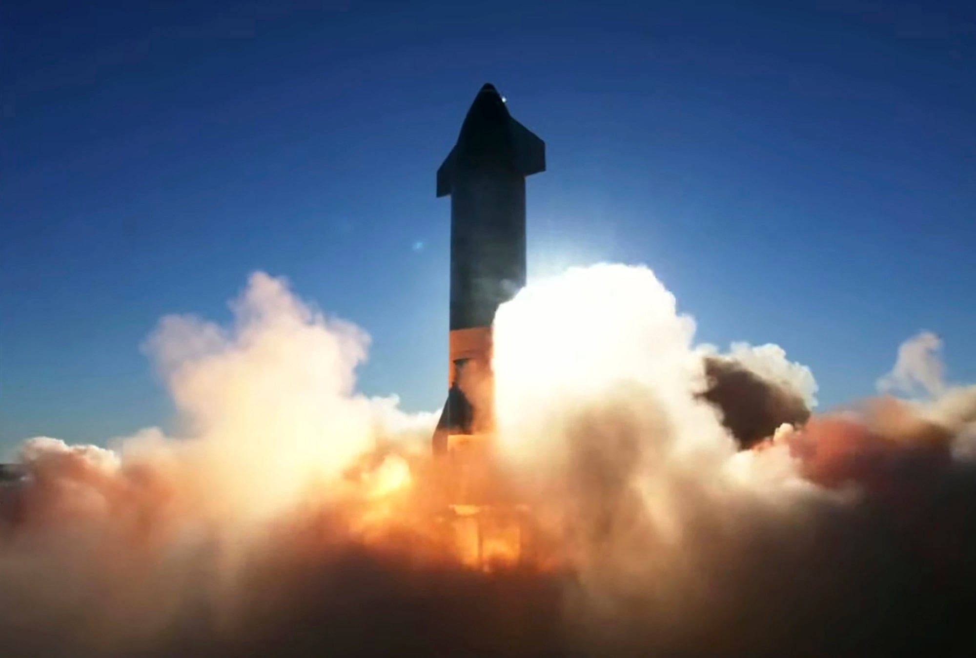 In this screen grab from video posted by SpaceX, the company's Starship launches for a test flight, Wednesday, Dec. 9, 2020, in a remote area of Texas. (SpaceX/AP/CP)