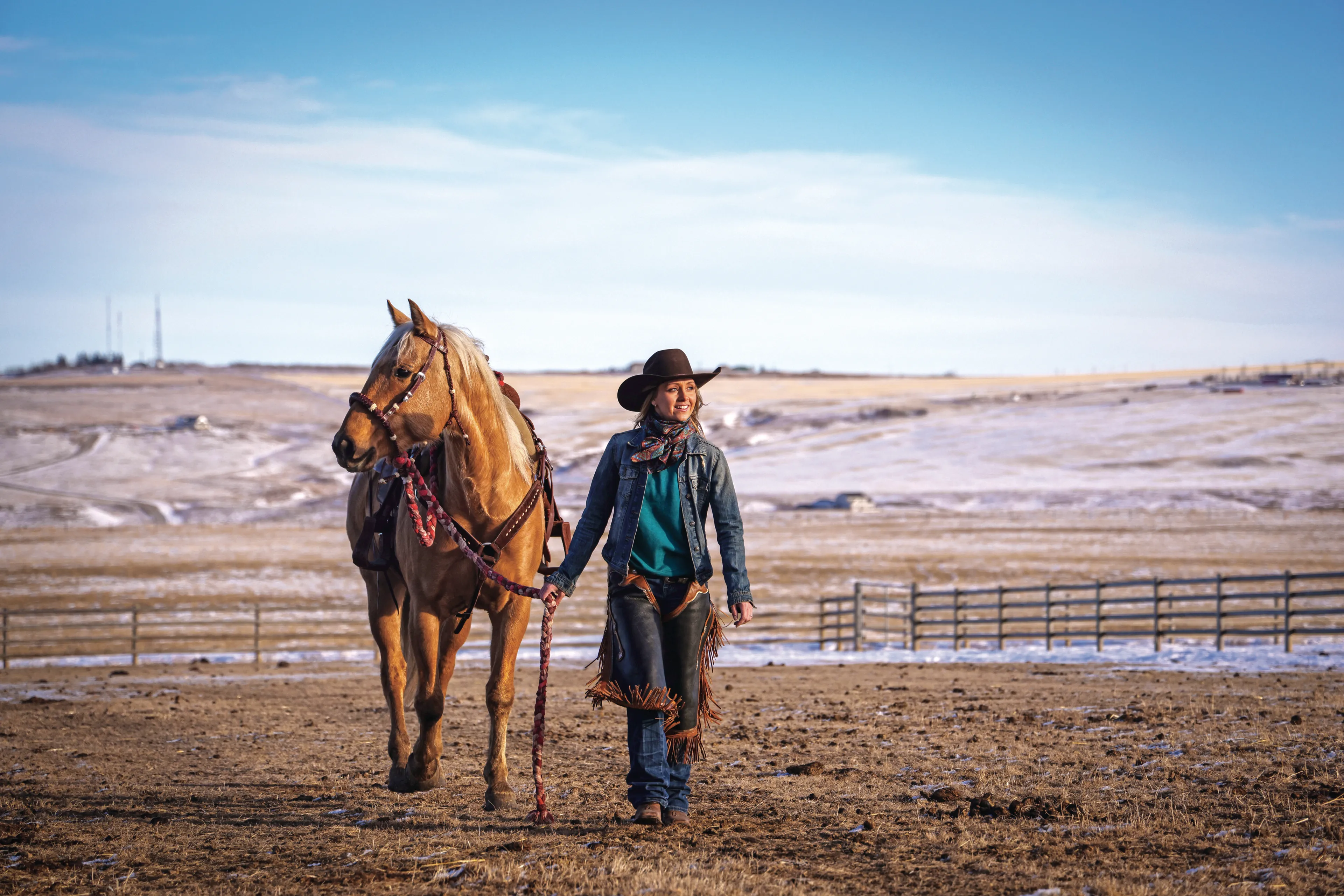 Canadian actress Amber Marshall and her horse Cruz, a palomino quarter house at her place near Calgary, Alberta on January 30, 2021. (Photograph by Leah Hennel)
