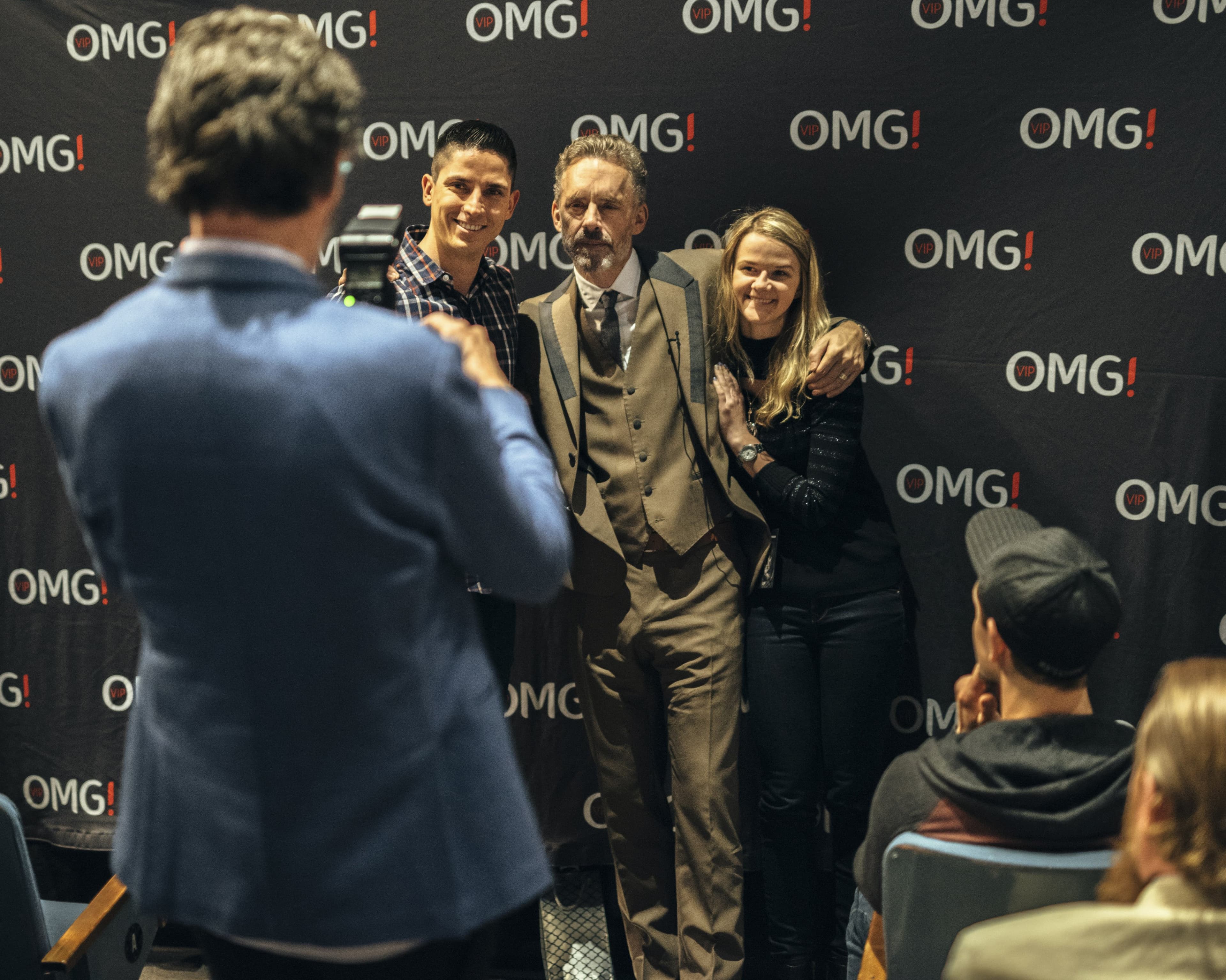 Fans are photographed with Peterson (Mark Sommerfeld/The New York Times/Redux)