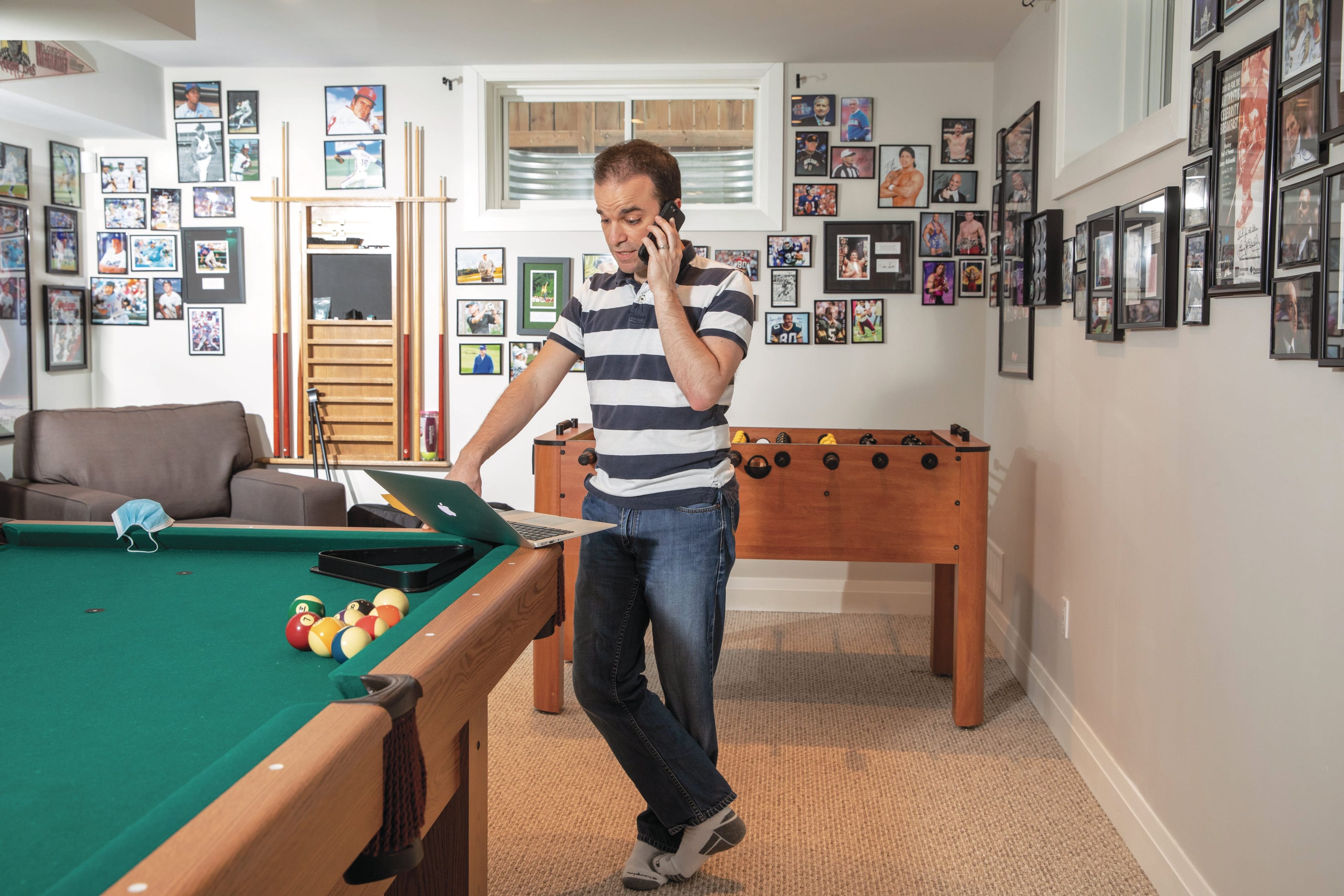 From his basement, Elia called each of his 172 patients who were eligible for the vaccine (Photograph by Brett Gundlock)