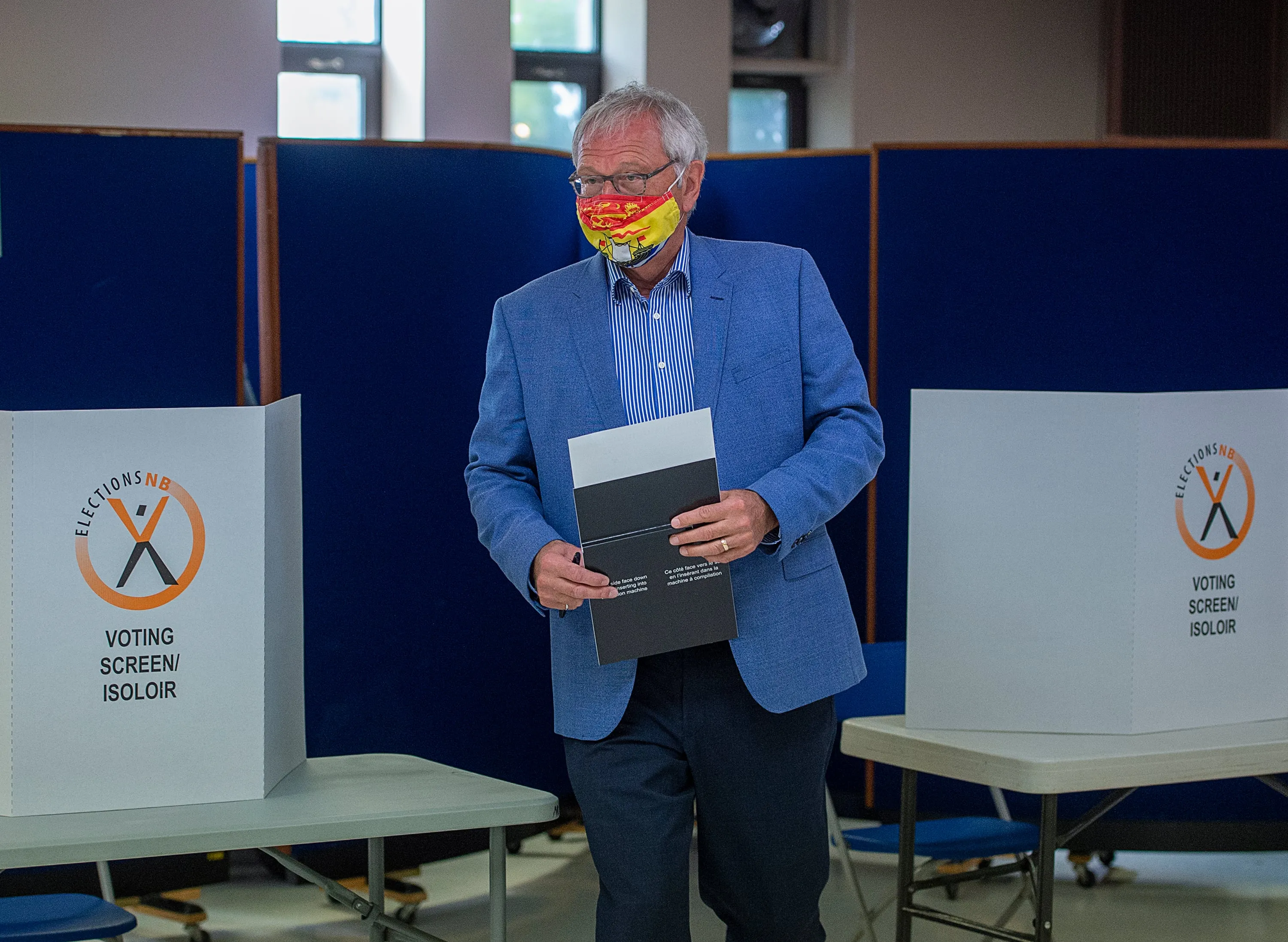 Premier Blaine Higgs heads to cast his vote in the New Brunswick provincial election in Quispamsis, N.B. on Sept. 14, 2020 (CP/Andrew Vaughan)