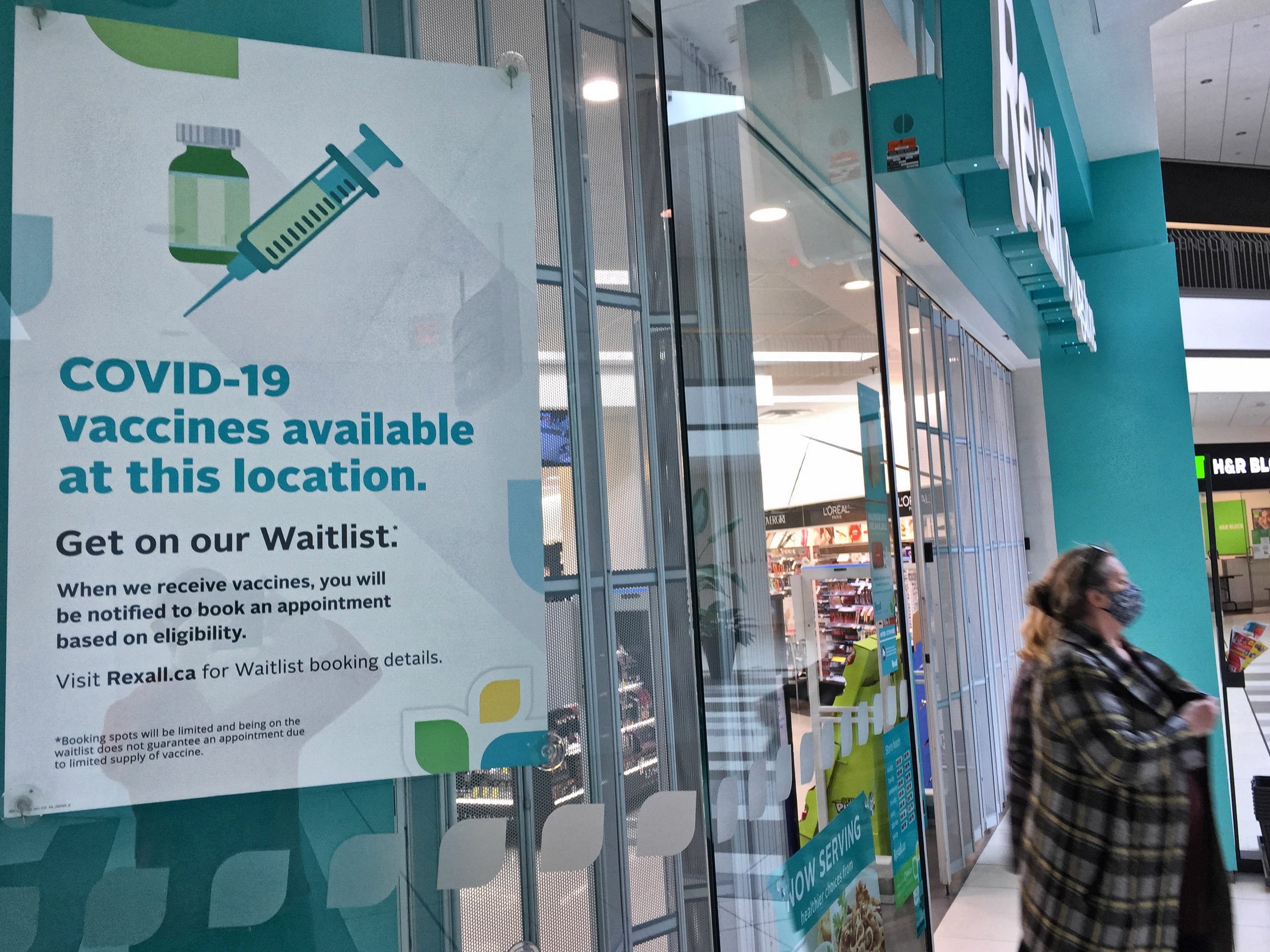 Sign at a pharmacy informing people to join the waitlist to receive the AstraZeneca / COVISHIELD novel coronavirus (COVID-19) vaccine in Markham, Ontario, Canada on April 15, 2021. (Photo by Creative Touch Imaging Ltd./NurPhoto via Getty Images)