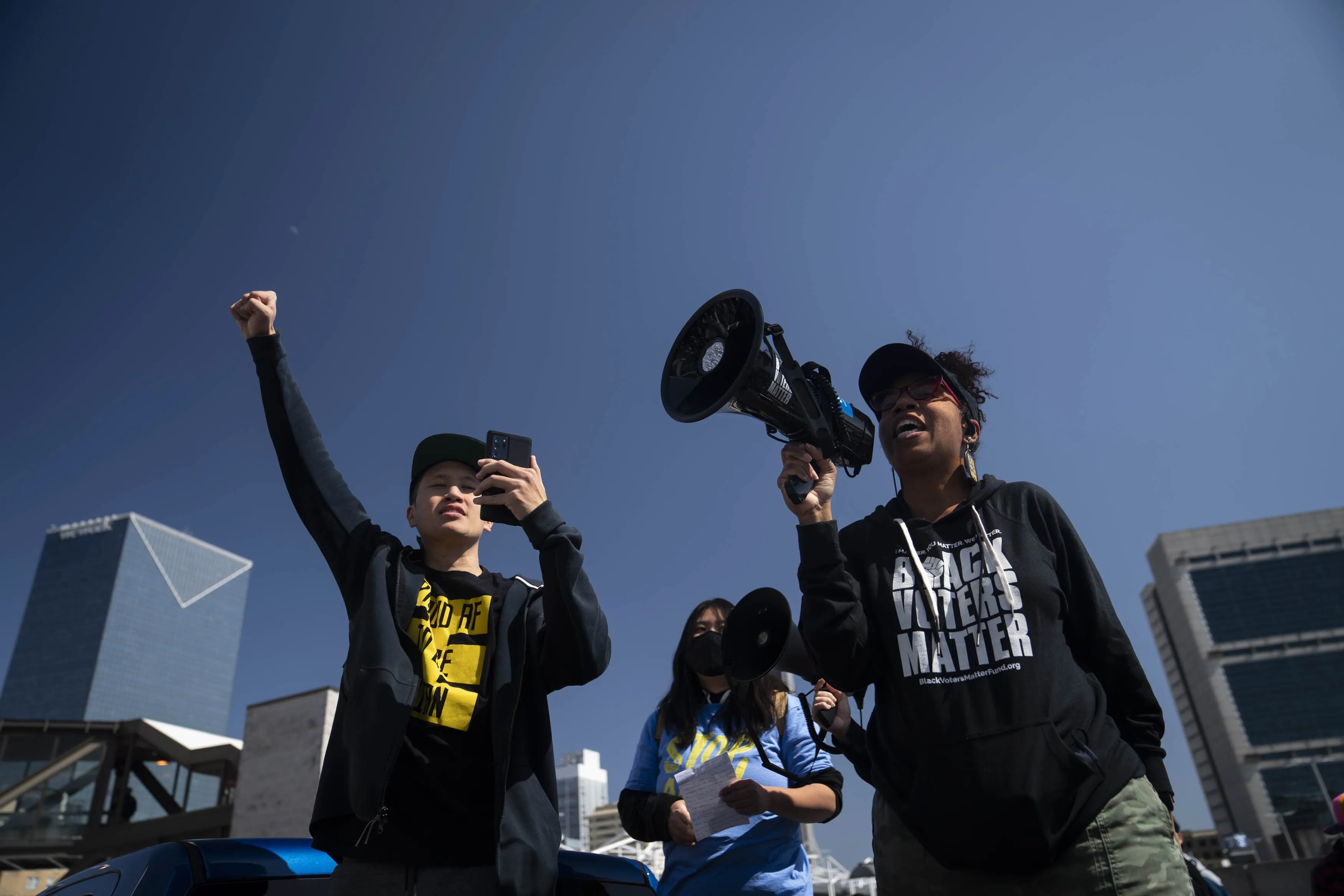 Activist William Lex Ham, left, and Wanda Mosley, Senior Coordinator in Georgia at Black Voters Matter, speak at a Stop AAPI Hate Rally in Atlanta, Georgia, U.S., on Saturday, March 20, 2021. Stop AAPI Hate, a group that tracks anti-Asian violence, said it had received nearly 3,800 reports of hate incidents since mid March, 2020, around the time that the Covid-19 pandemic seized the U.S. More than 500 of those came in the first two months of 2021. (Nicole Craine/Bloomberg/Getty Images)