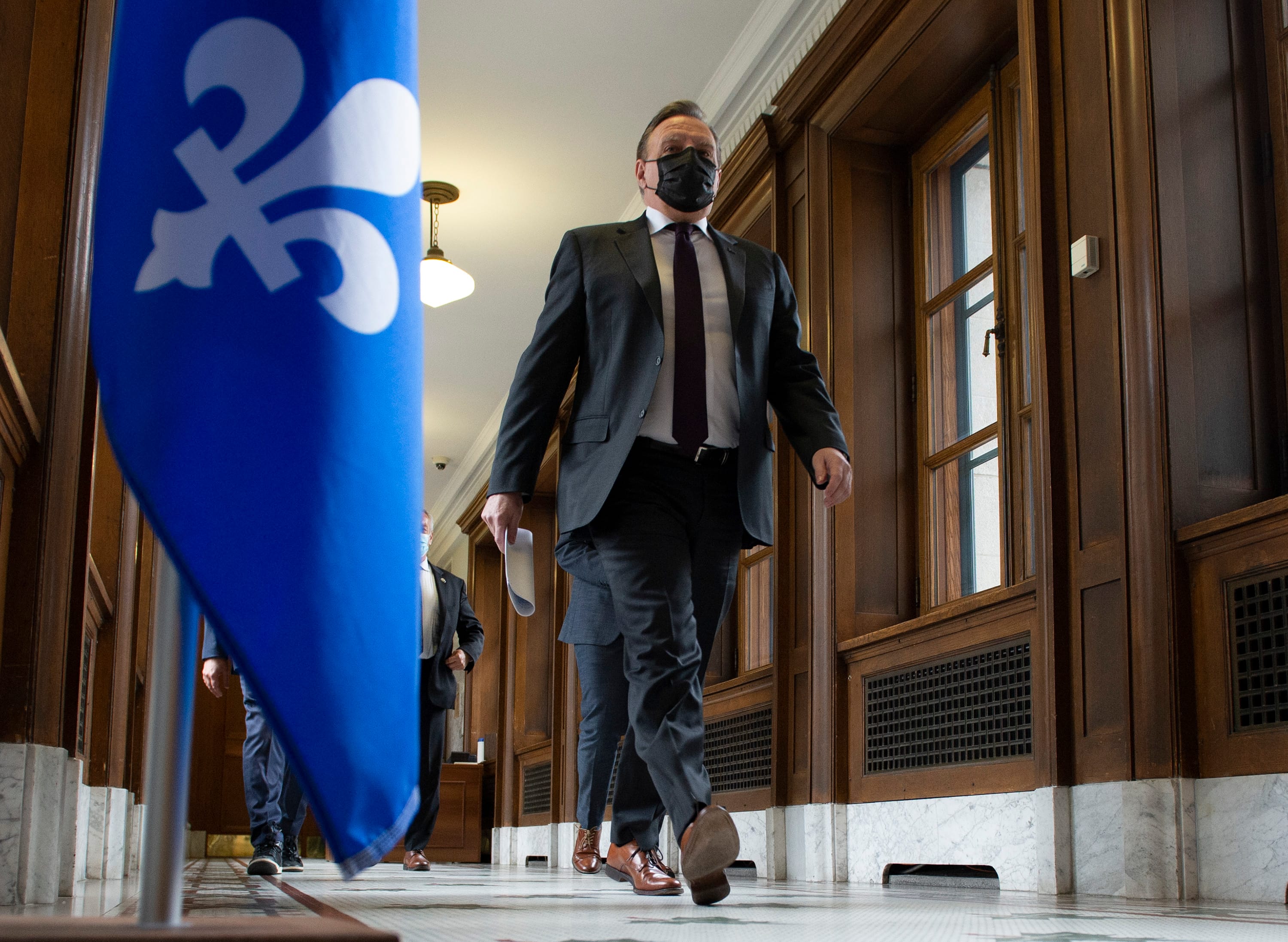Legault walks to a news conference before Question Period on May 6, 2021 at the legislature in Quebec City (CP/Jacques Boissinot)