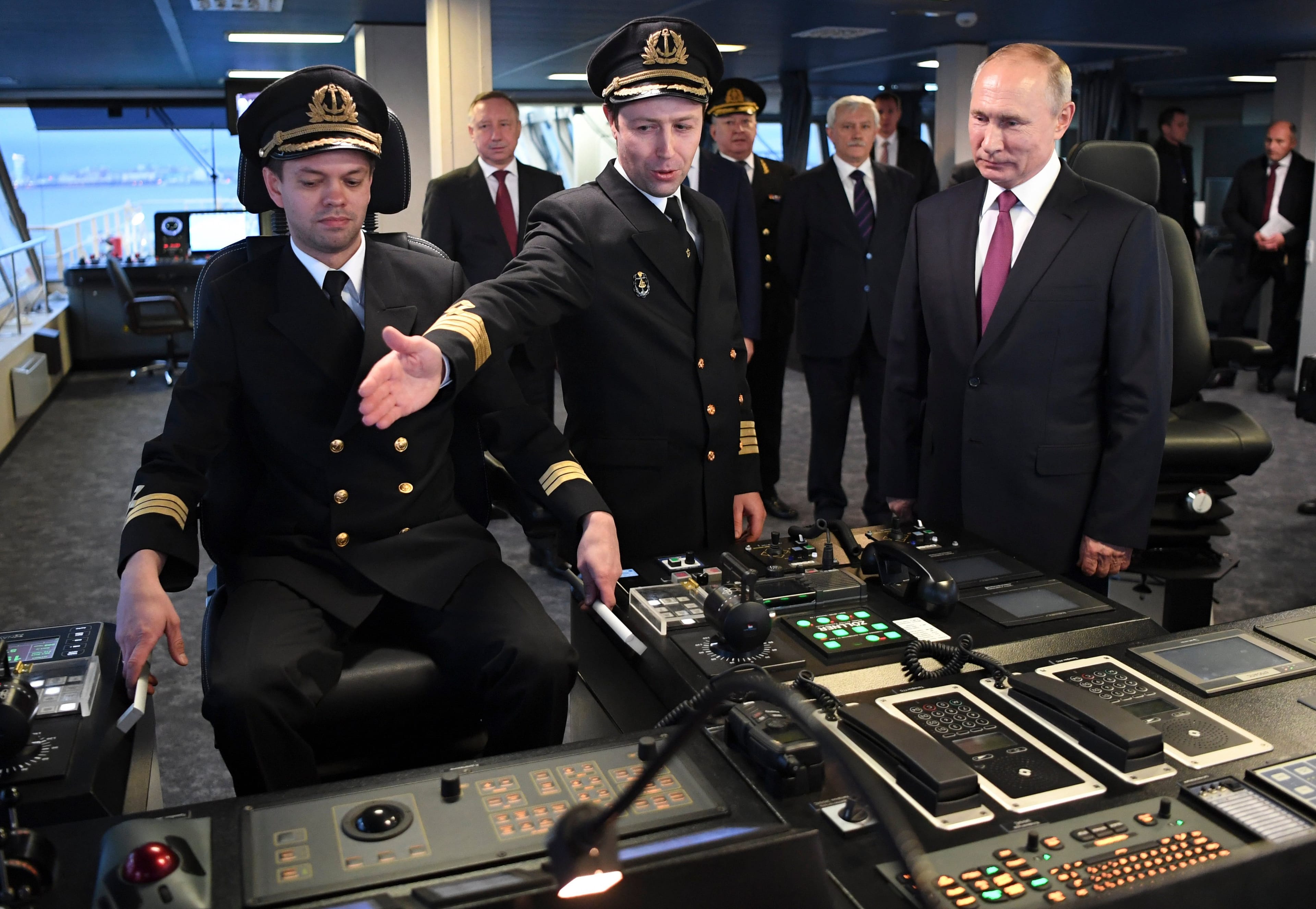 Putin, right, visiting the bridge of the newly built icebreaker Viktor Chernomyrdin in St. Petersburg, Russia, in November. Russia is rapidly expanding its fleet of icebreakers as it expands its reach in the Arctic. (Alexei Nikolsky, Sputnik, Kremlin Pool Photo via AP)