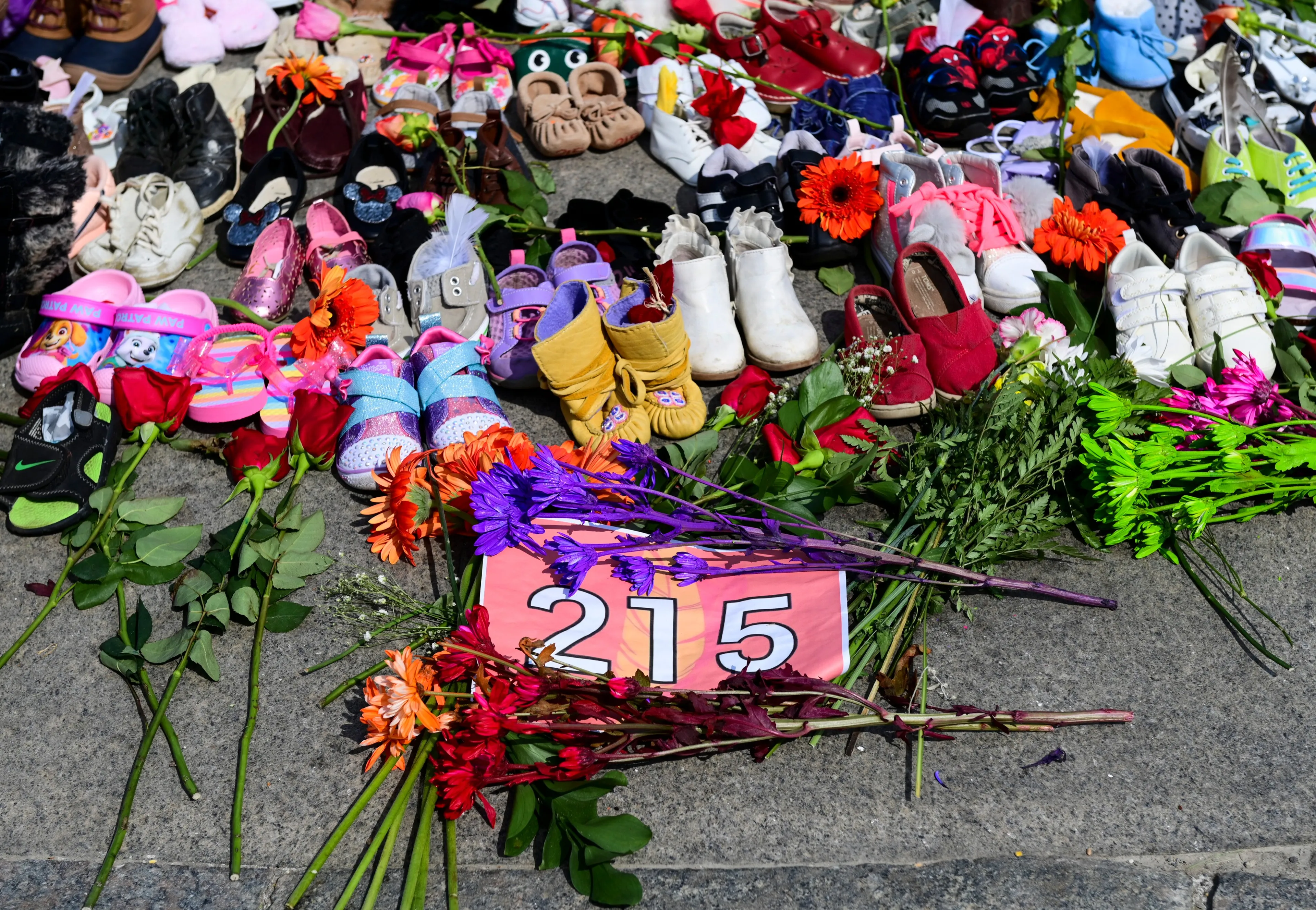 A memorial is pictured at the Eternal flame on Parliament Hill in Ottawa on Tuesday, June 1, 2021, in recognition of discovery of children's remains at the site of a former residential school in Kamloops, B.C. THE CANADIAN PRESS/Sean Kilpatrick